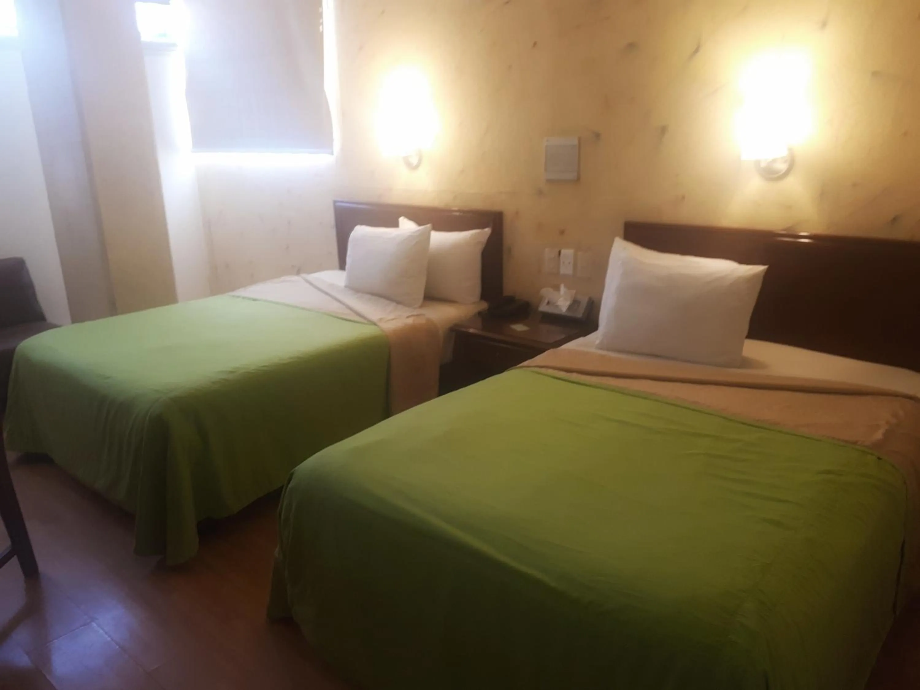 Bed in Hotel Enterprise Inn Plaza