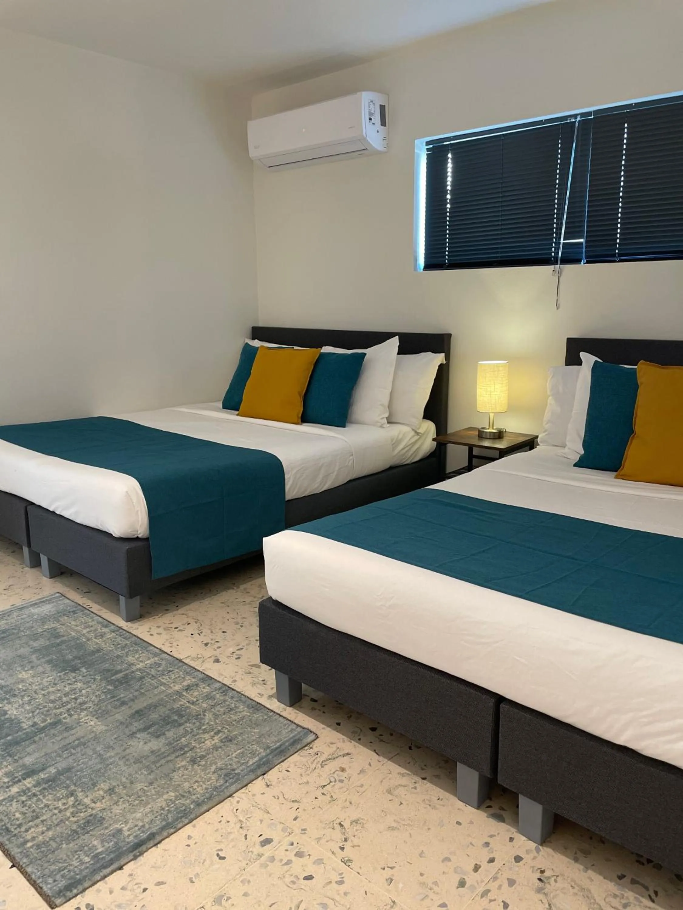 Bed in Vistalmar Ocean Suites