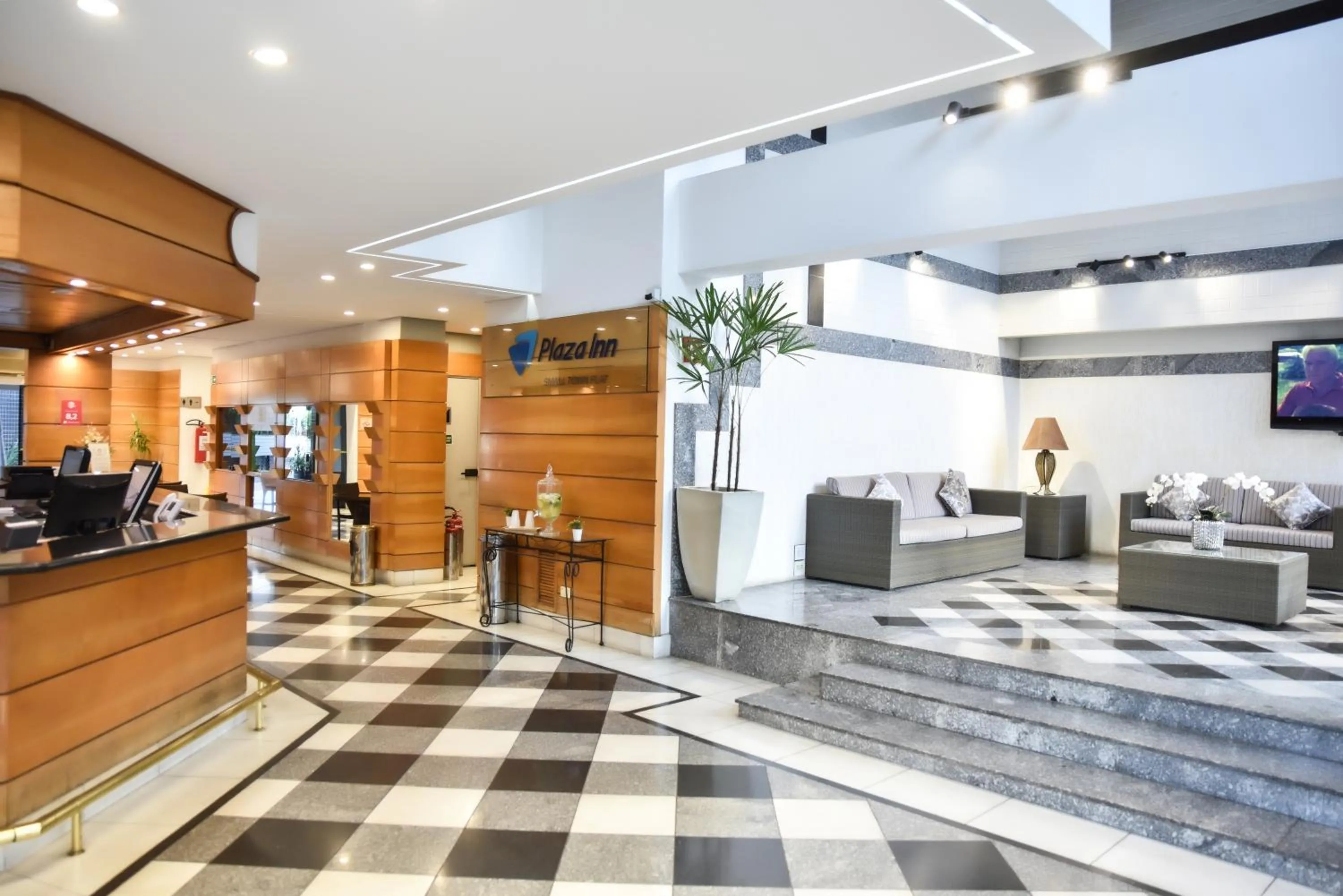 Lobby or reception in Plaza Inn Small Town Flat