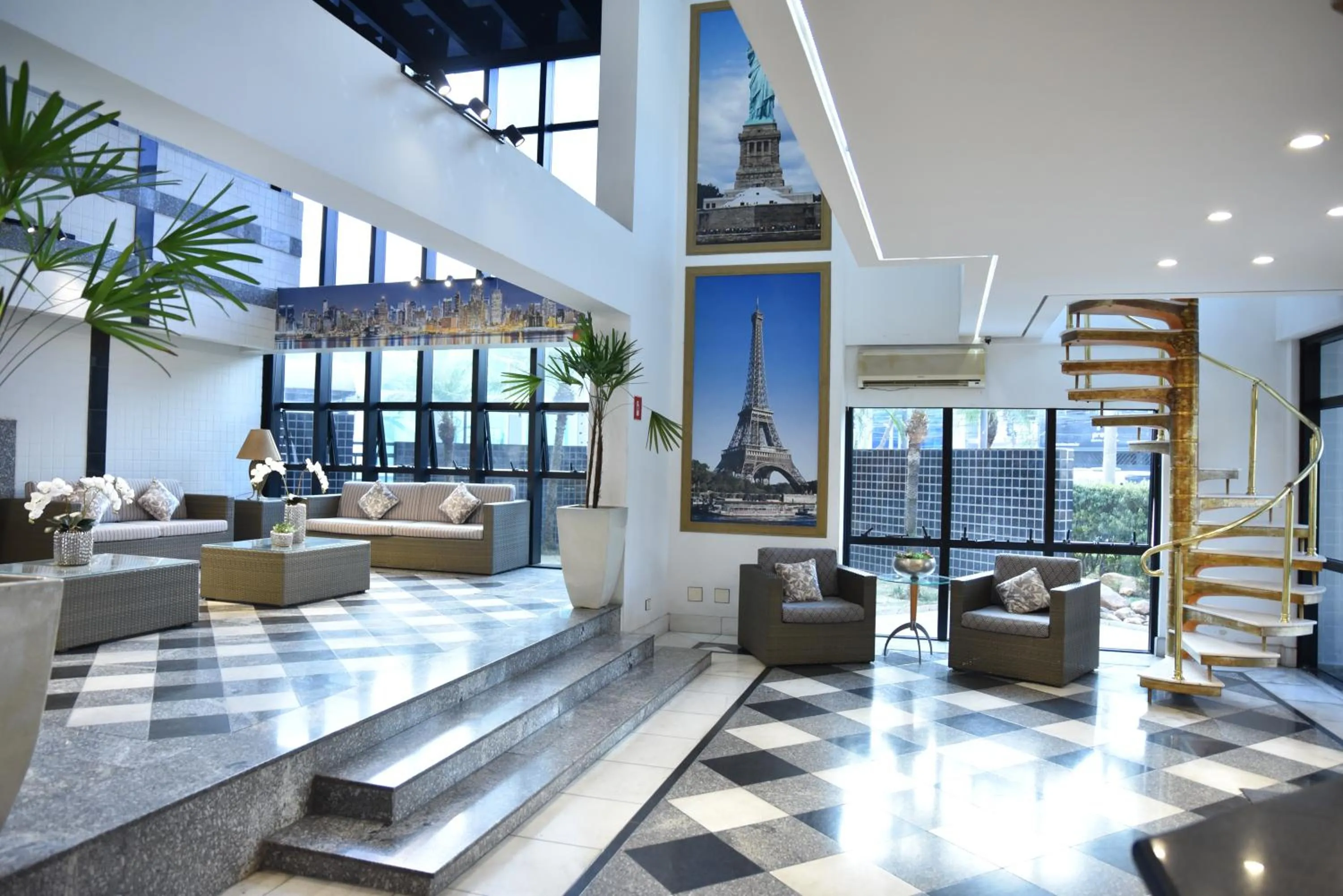 Lobby or reception in Plaza Inn Small Town Flat