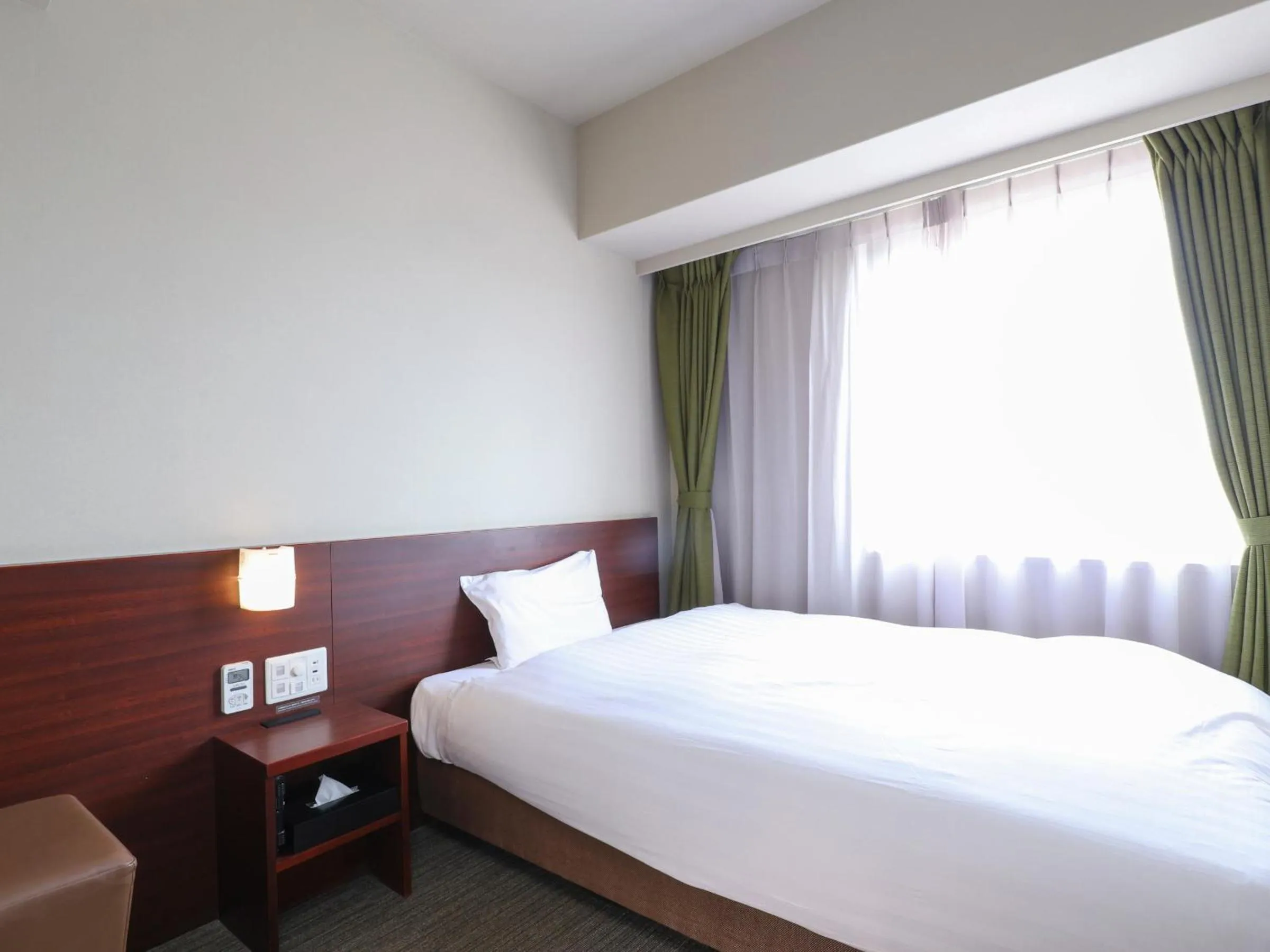 Bed in Dormy Inn Himeji Natural Hot Spring