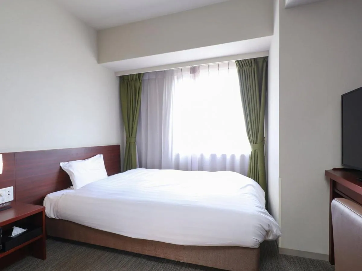 Bed in Dormy Inn Himeji Natural Hot Spring