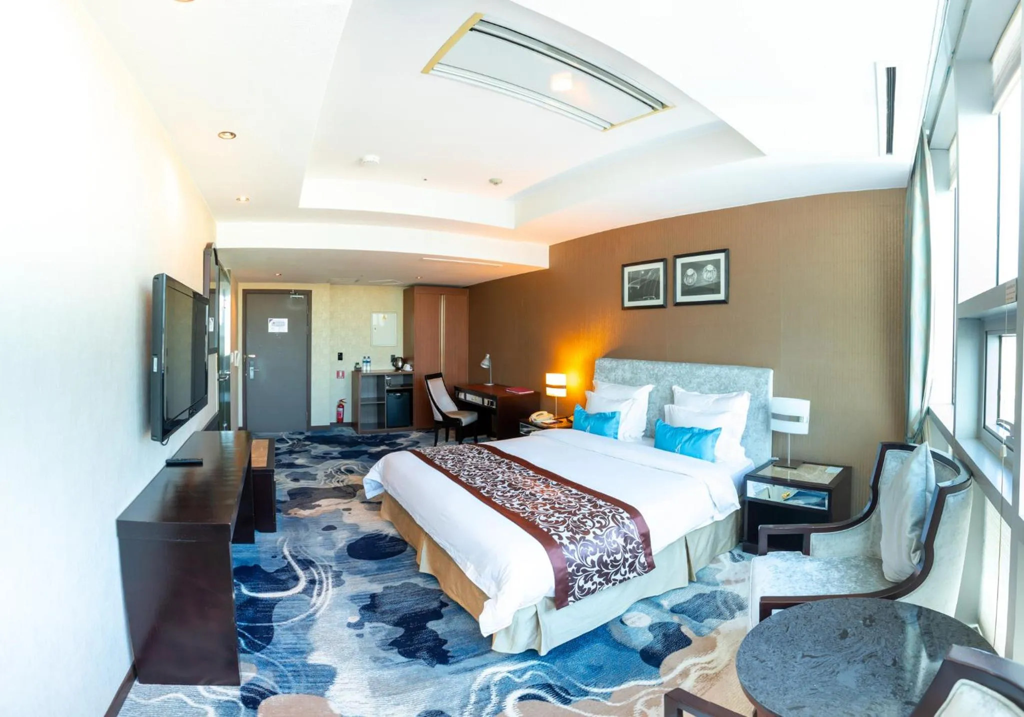 Bed in The Blue Sky Hotel and Tower