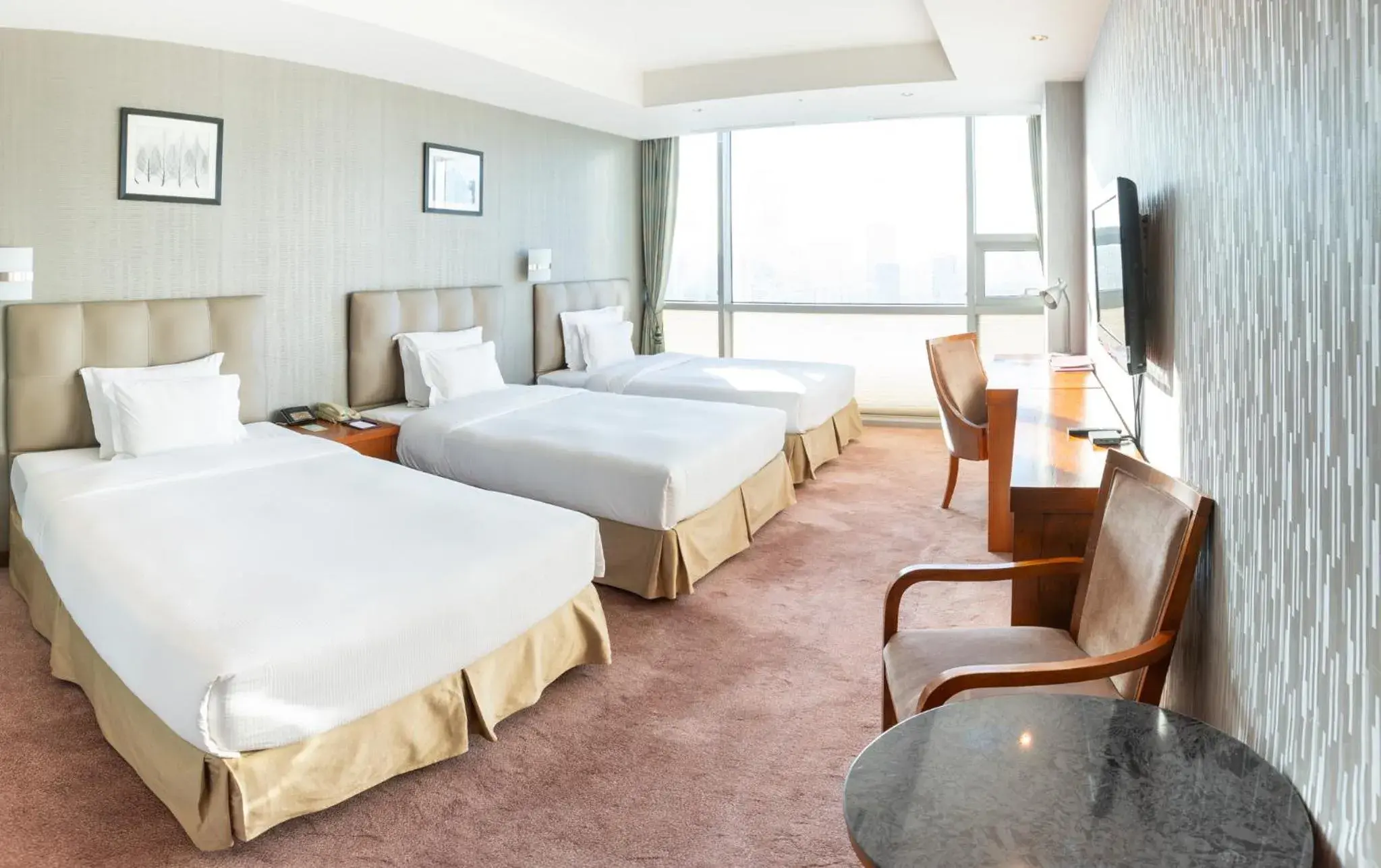 Deluxe Triple Room in The Blue Sky Hotel and Tower Deluxe Triple Room in The Blue Sky Hotel and Tower