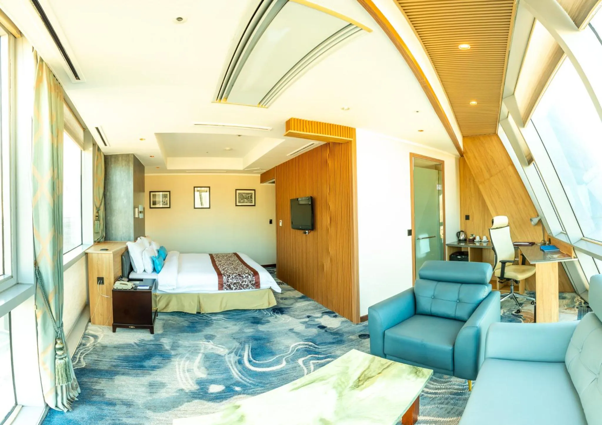 Bed in The Blue Sky Hotel and Tower