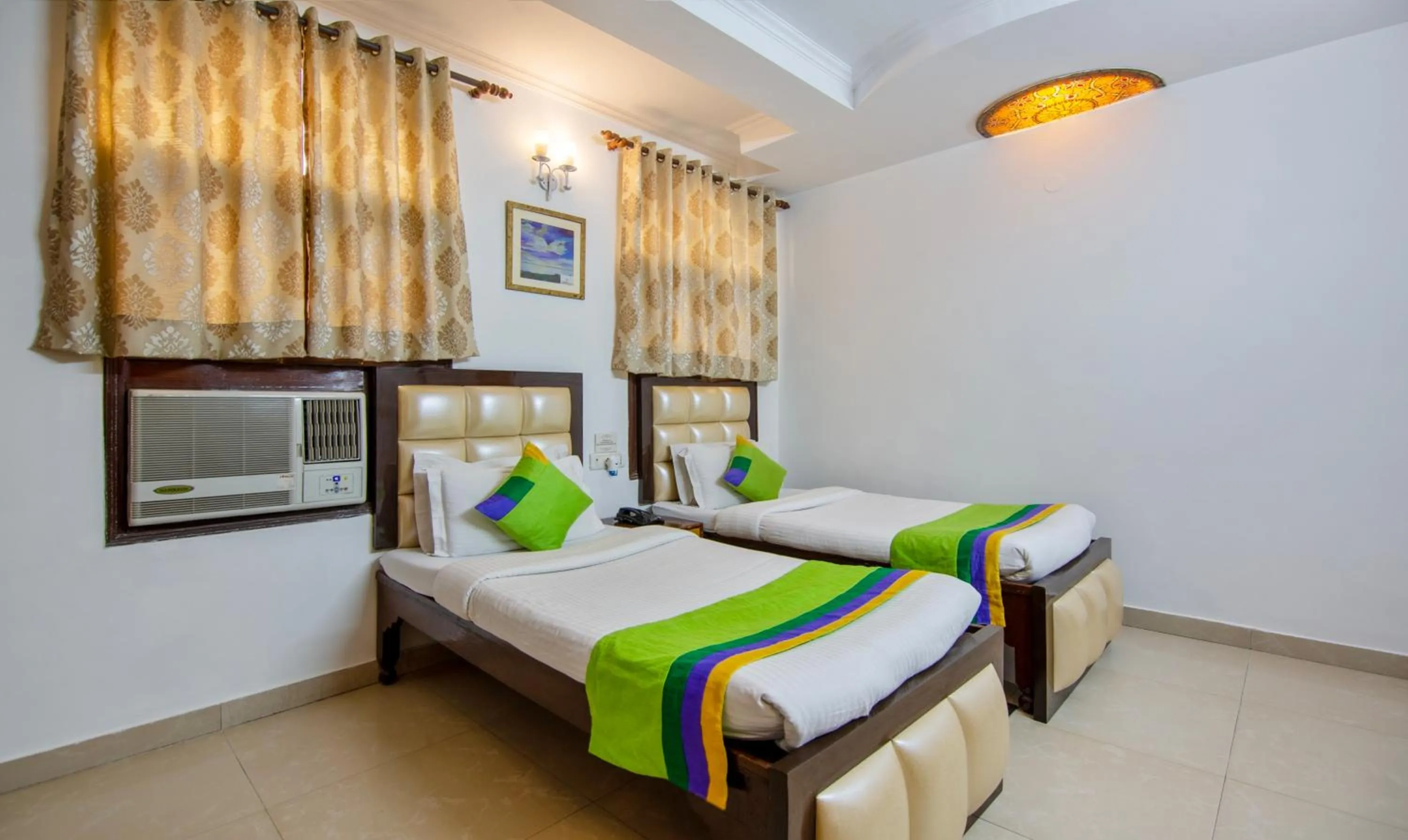 Bedroom, Bed in Treebo Paras International