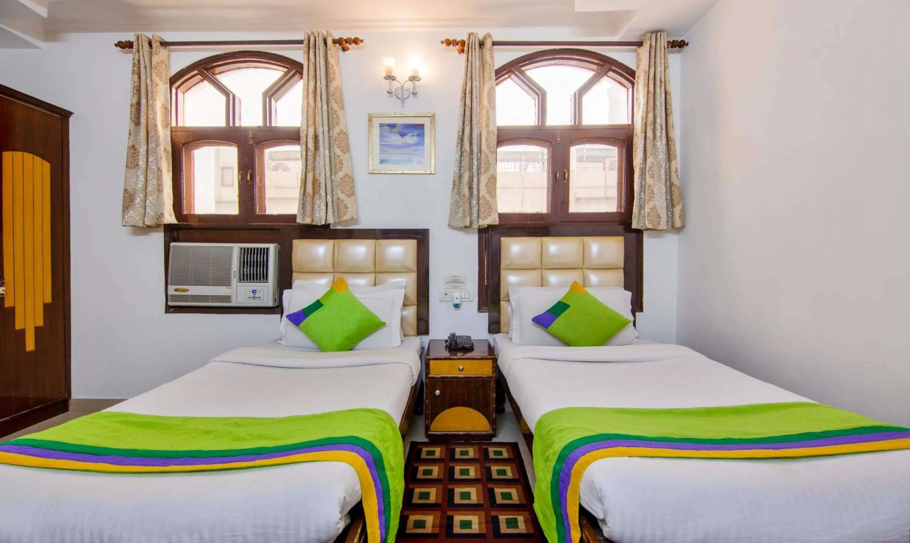 Bedroom, Bed in Treebo Paras International