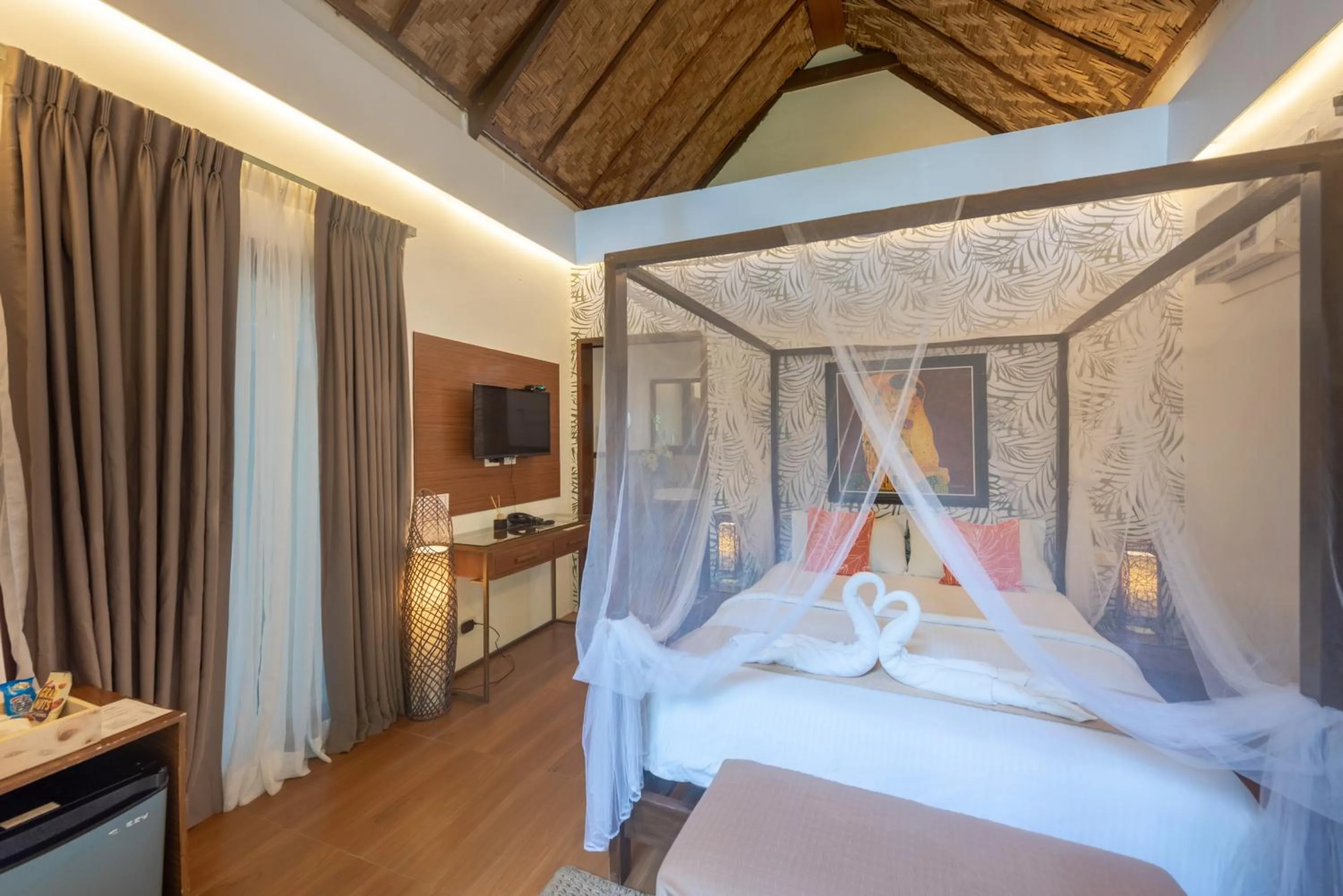 Photo of the whole room, Bed in The Hillside Resort Siargao