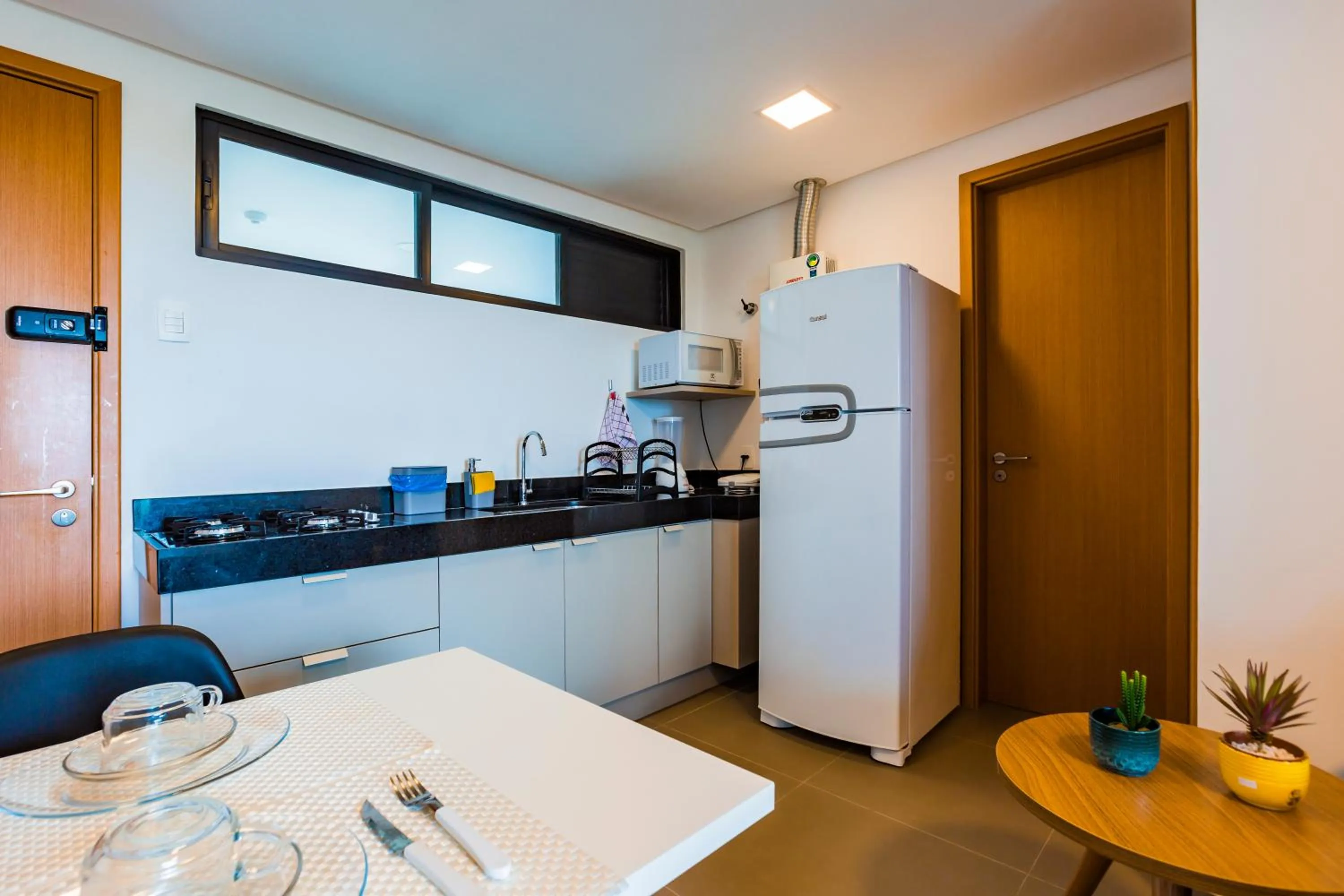 Kitchen or kitchenette in Macuco Residence