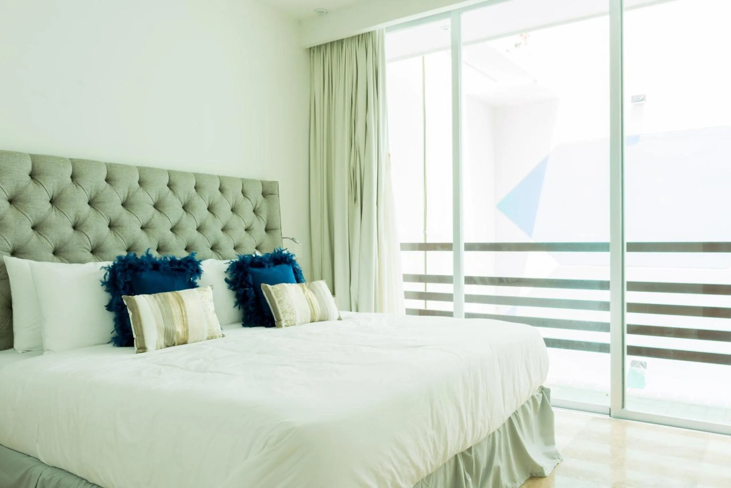 Bed in Tropic Playa Apartments