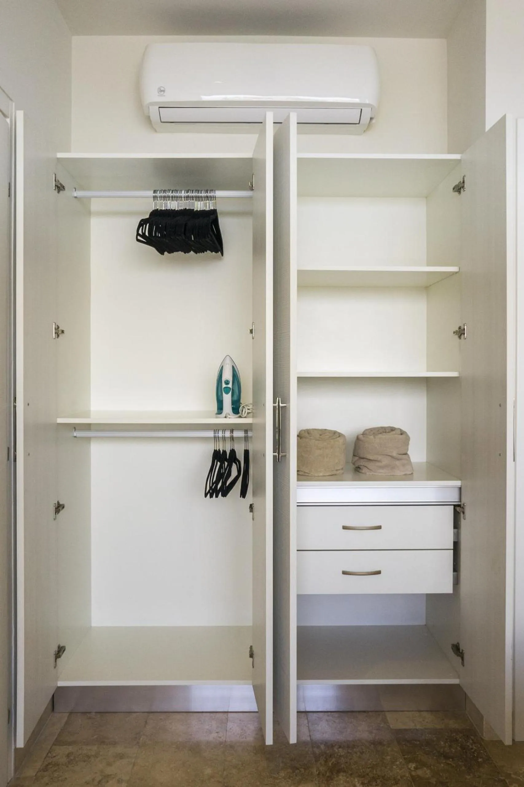 Bed in Tropic Playa Apartments