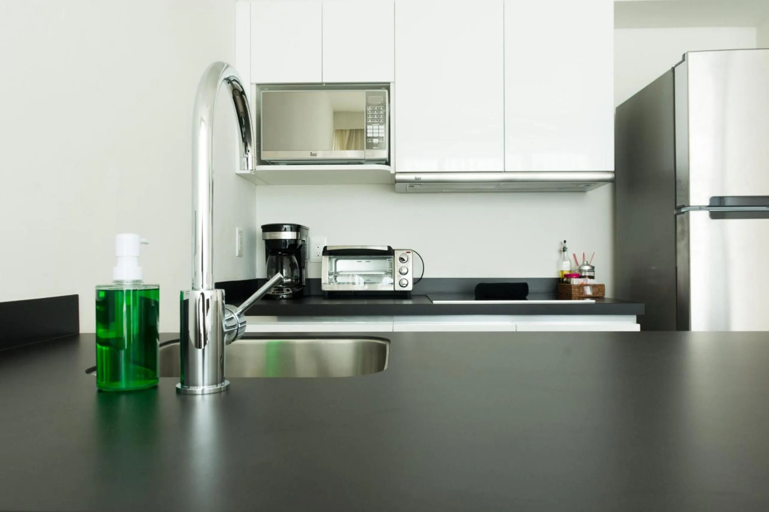 Kitchen or kitchenette in Tropic Playa Apartments