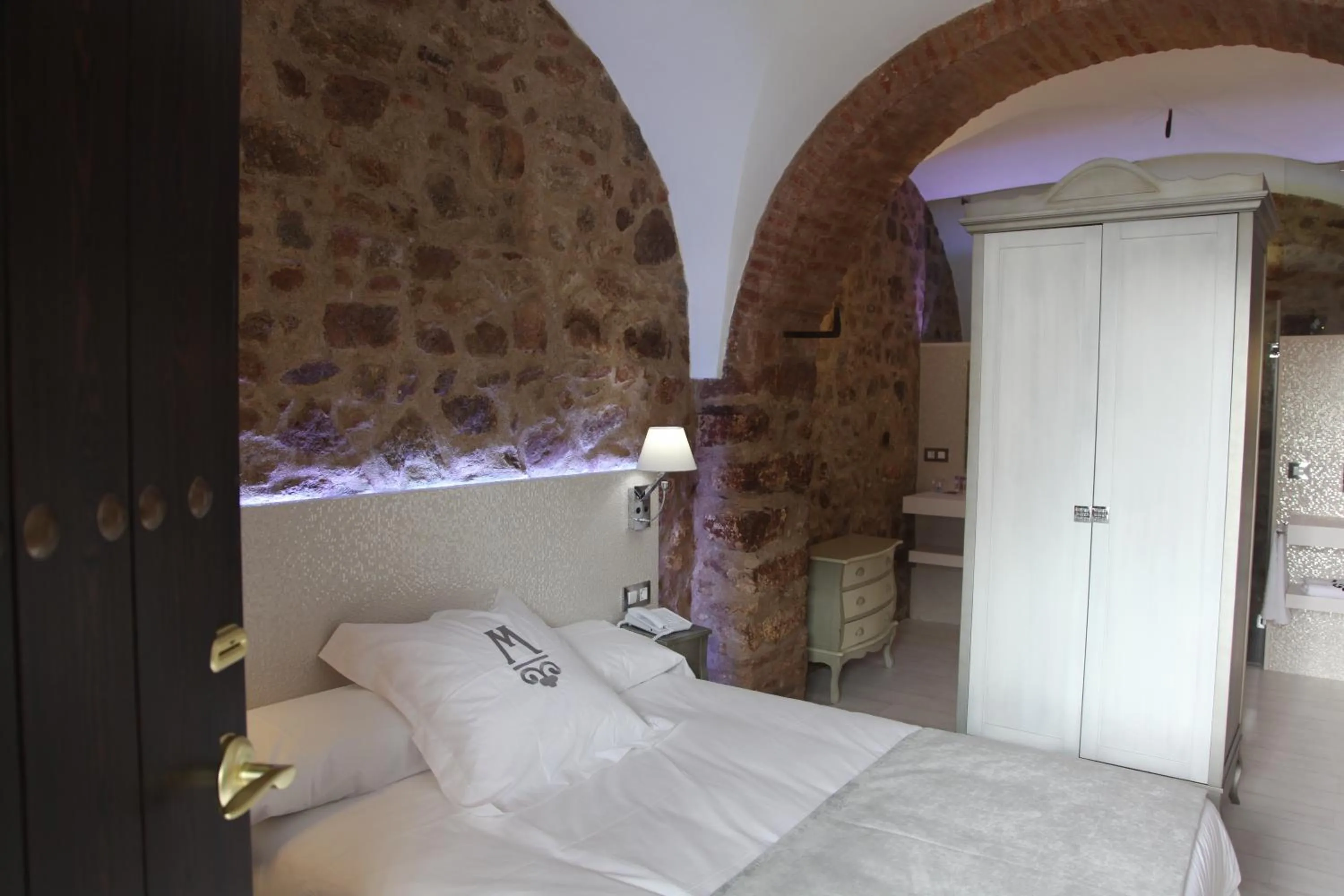 Bed in La Casa del Médico Hotel Boutique