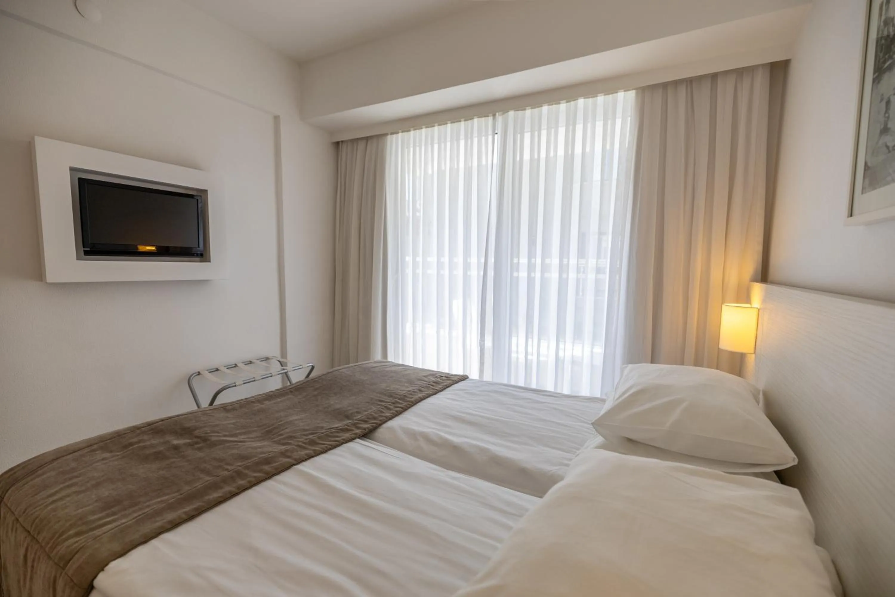 Bed in The Beachfront Hotel Adult Only 16 Plus