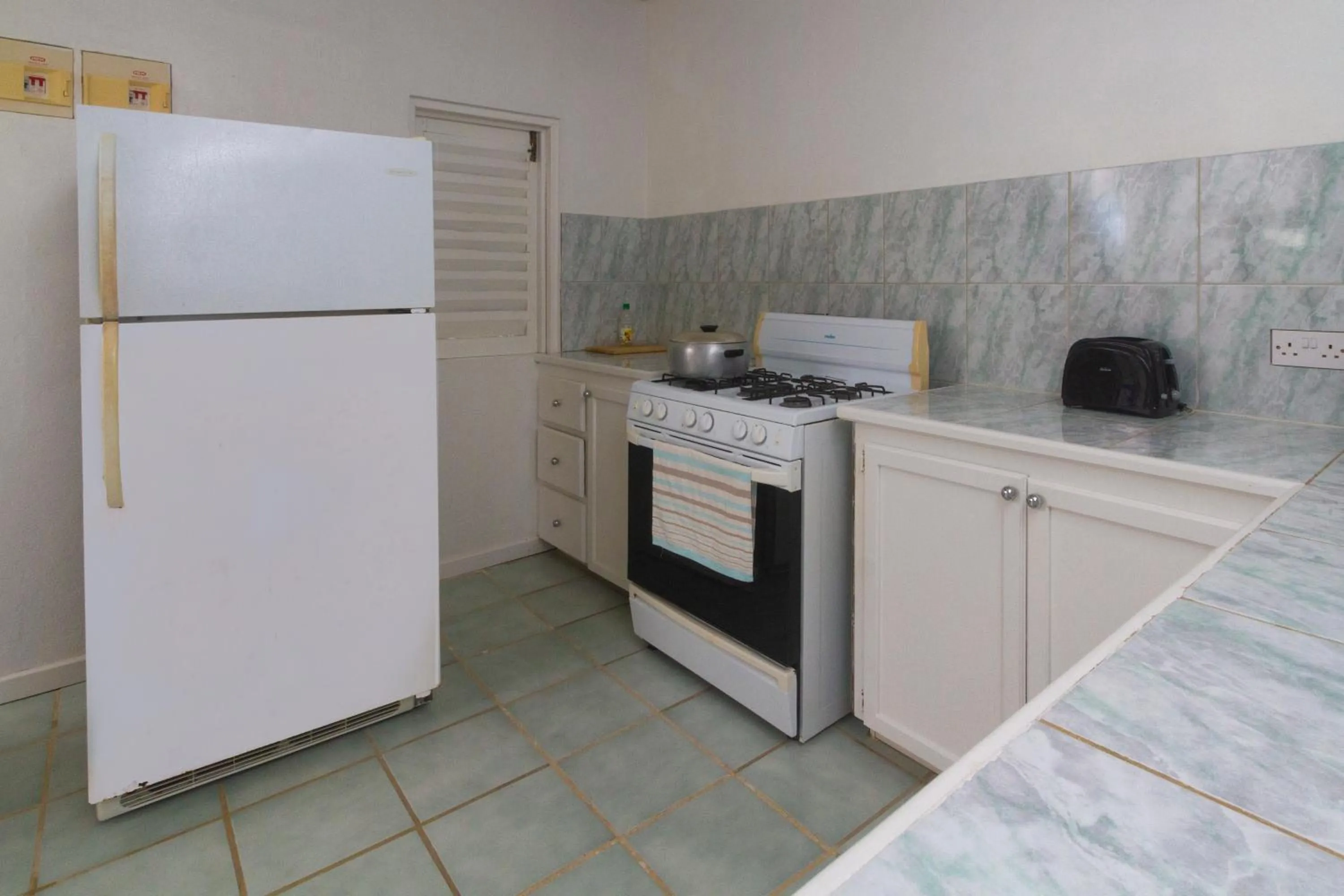 Kitchen or kitchenette in Bequia Beachfront Villas