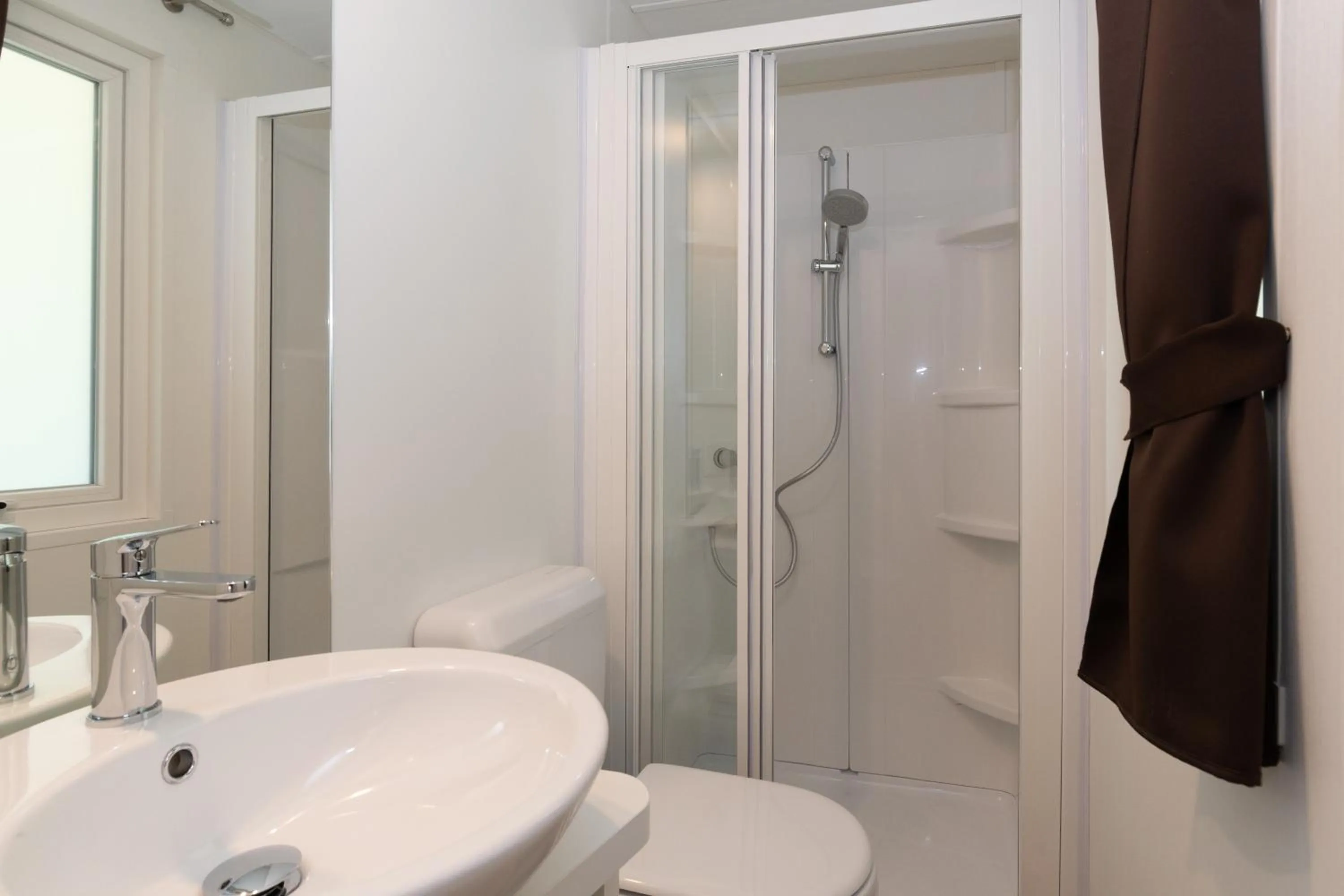 Bathroom in Club del Sole Marina Family Resort