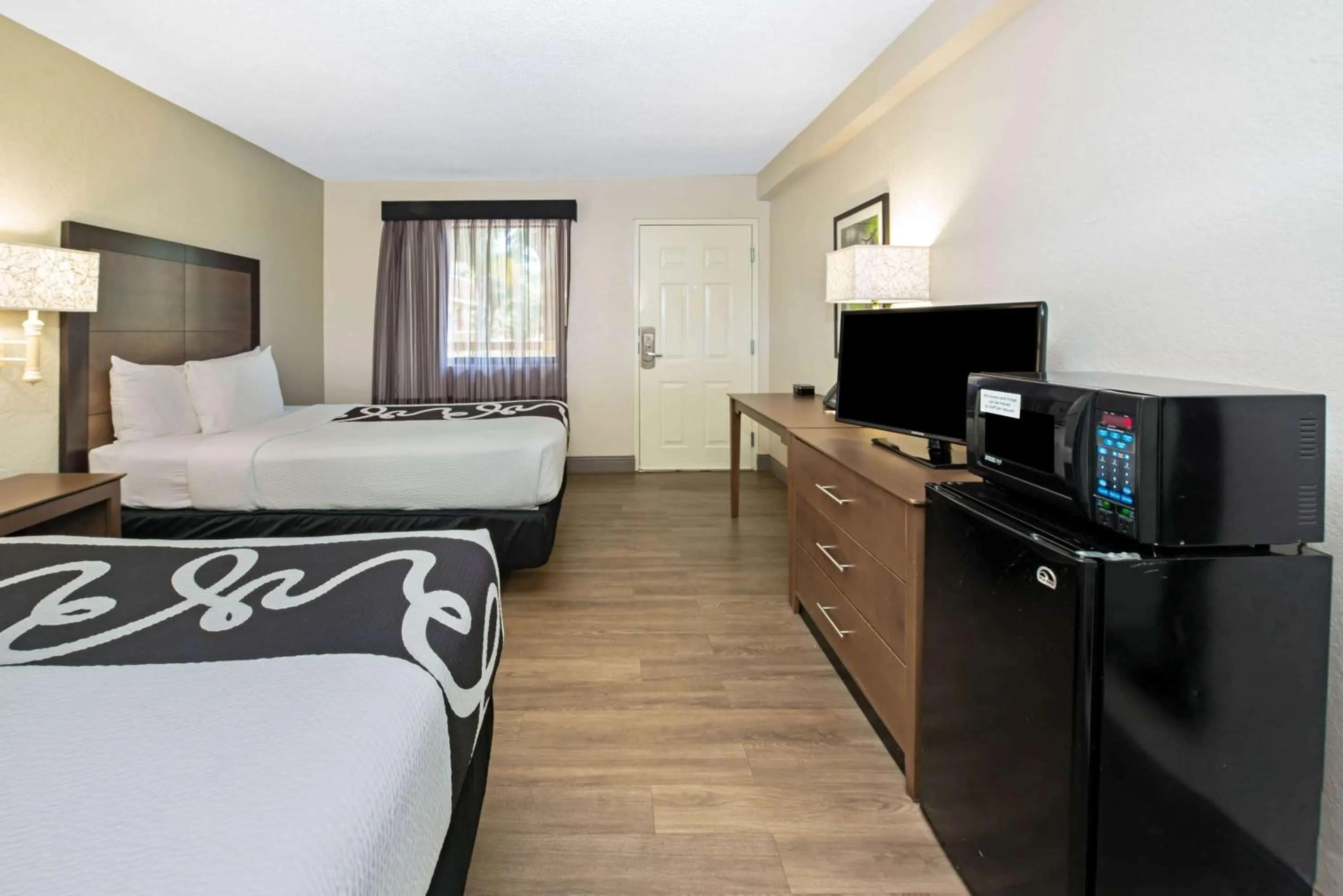 Photo of the whole room in La Quinta Inn by Wyndham West Palm Beach - Florida Turnpike