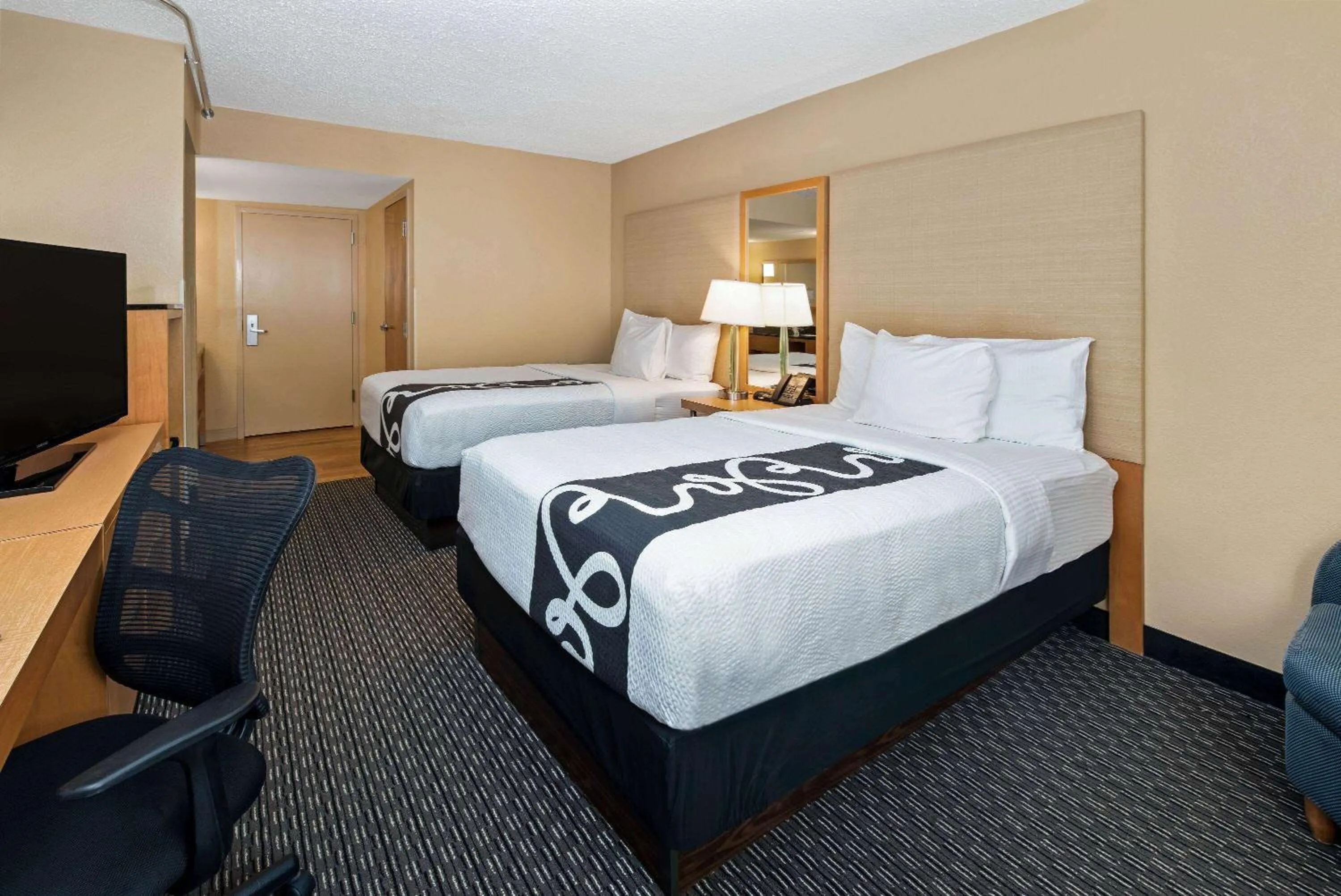 Photo of the whole room, Bed in La Quinta by Wyndham West Palm Beach Airport