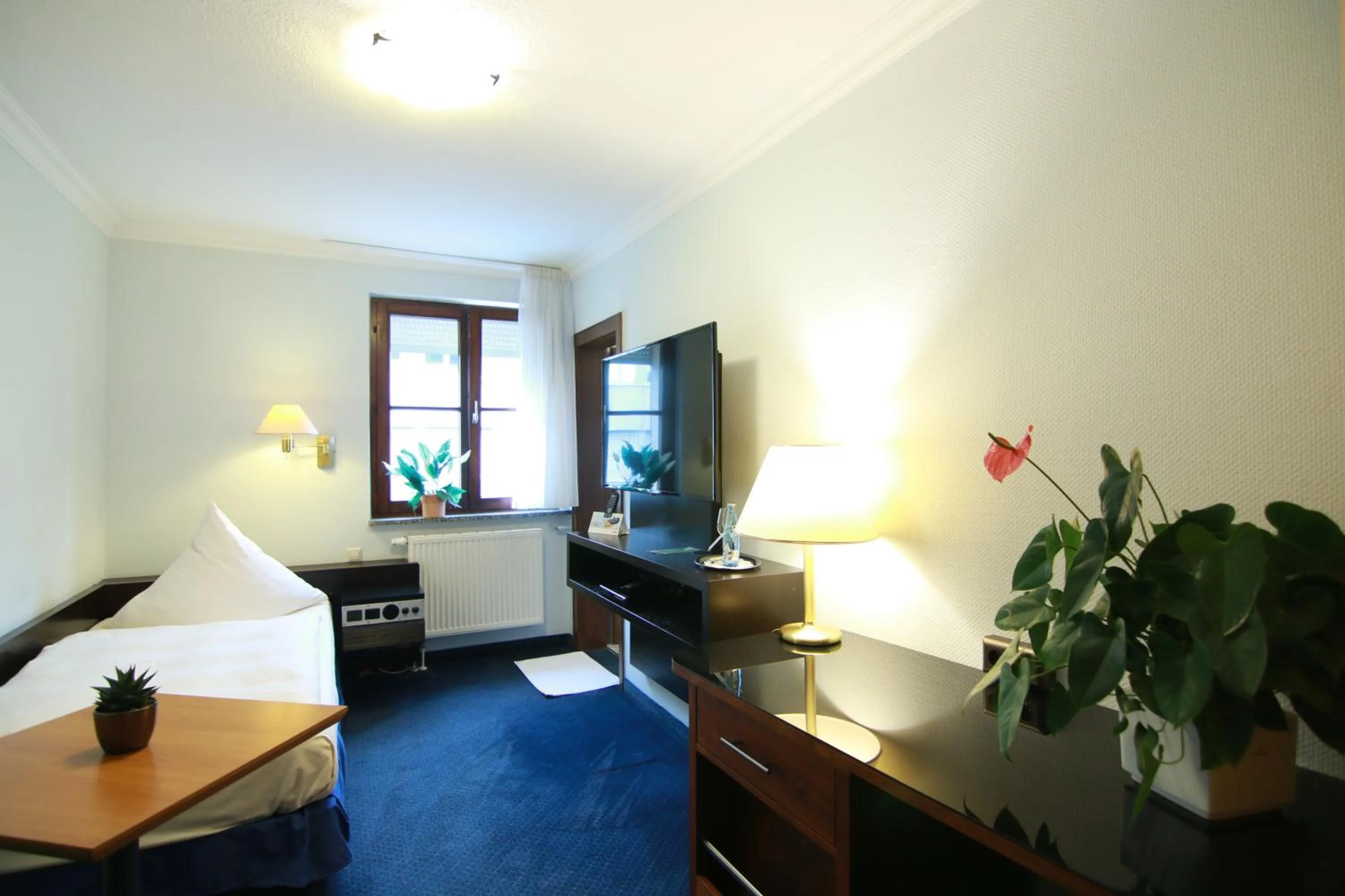 Photo of the whole room, Bed in Hotel-Restaurant Pfeffermühle Balingen