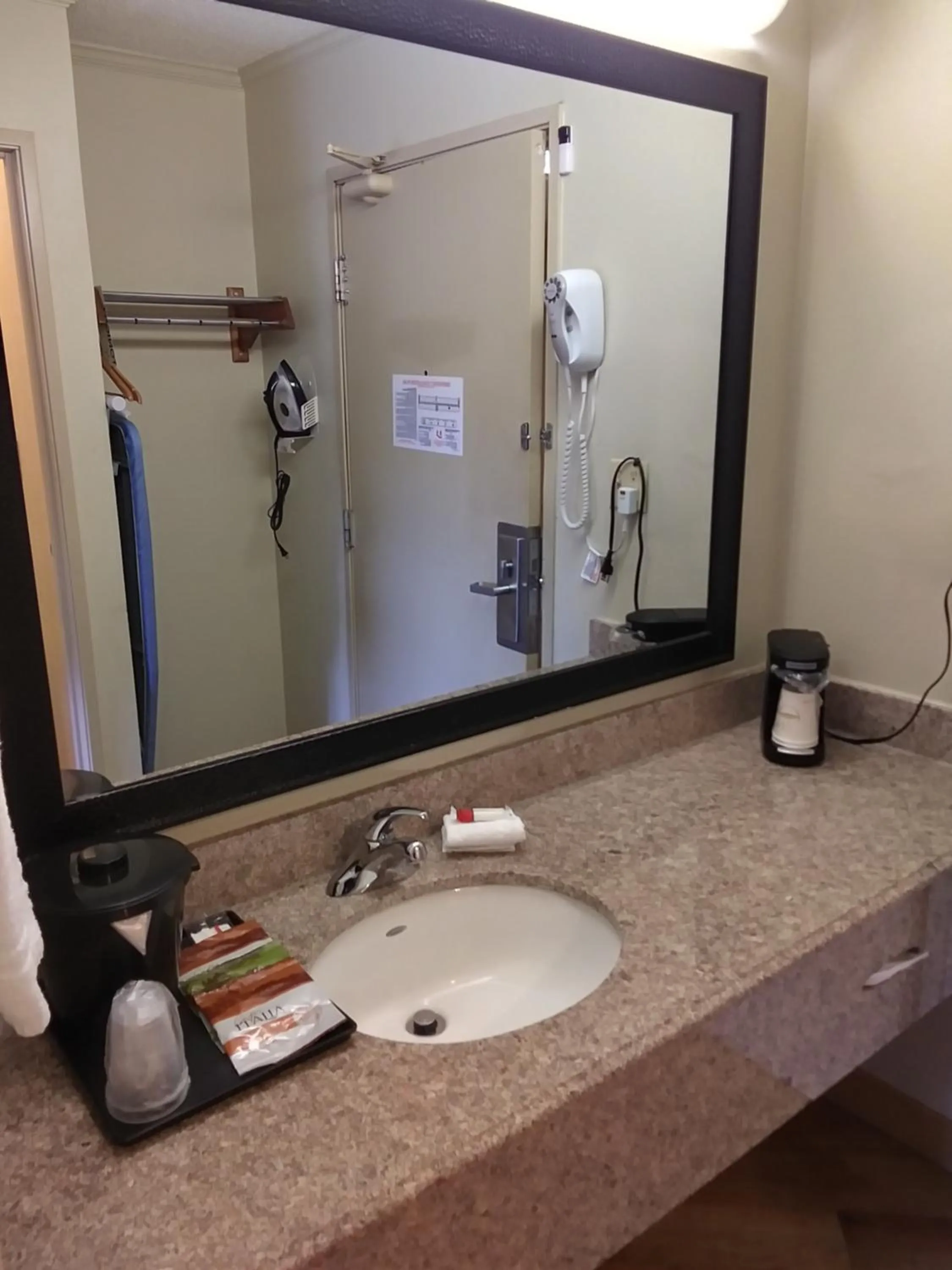 Bathroom in Travelodge by Wyndham Columbus State University