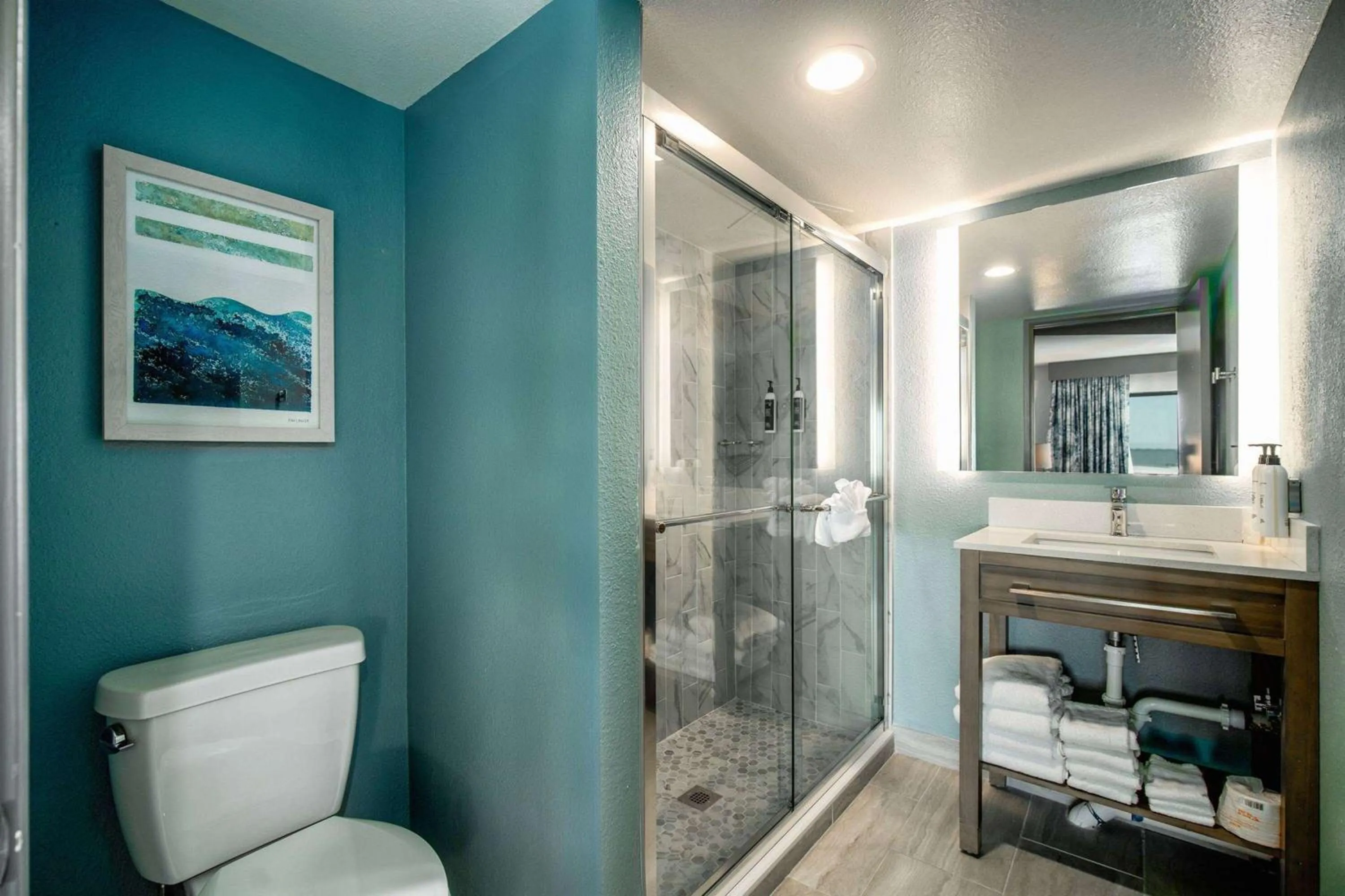 TV and multimedia in La Quinta by Wyndham Cocoa Beach Oceanfront