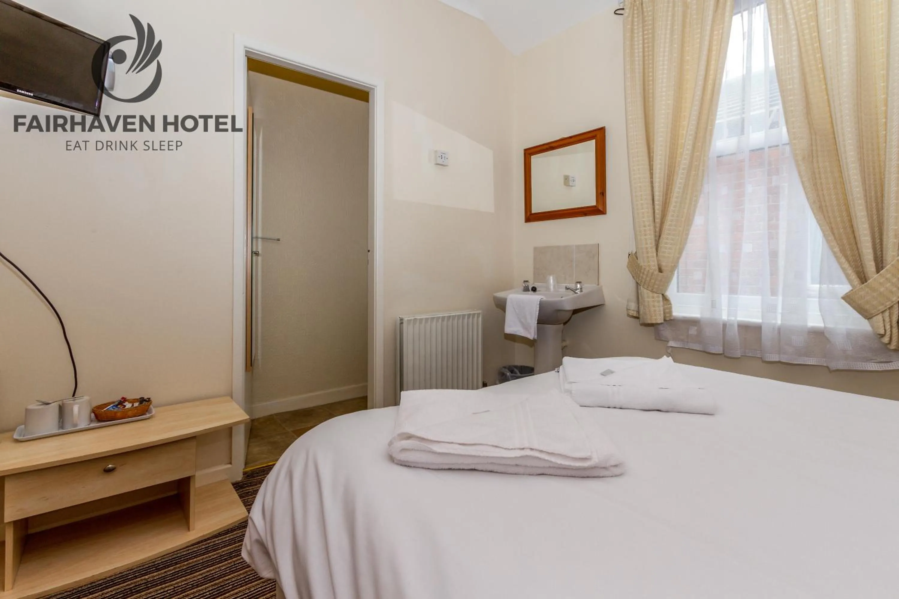 Bed in Fairhaven Hotel