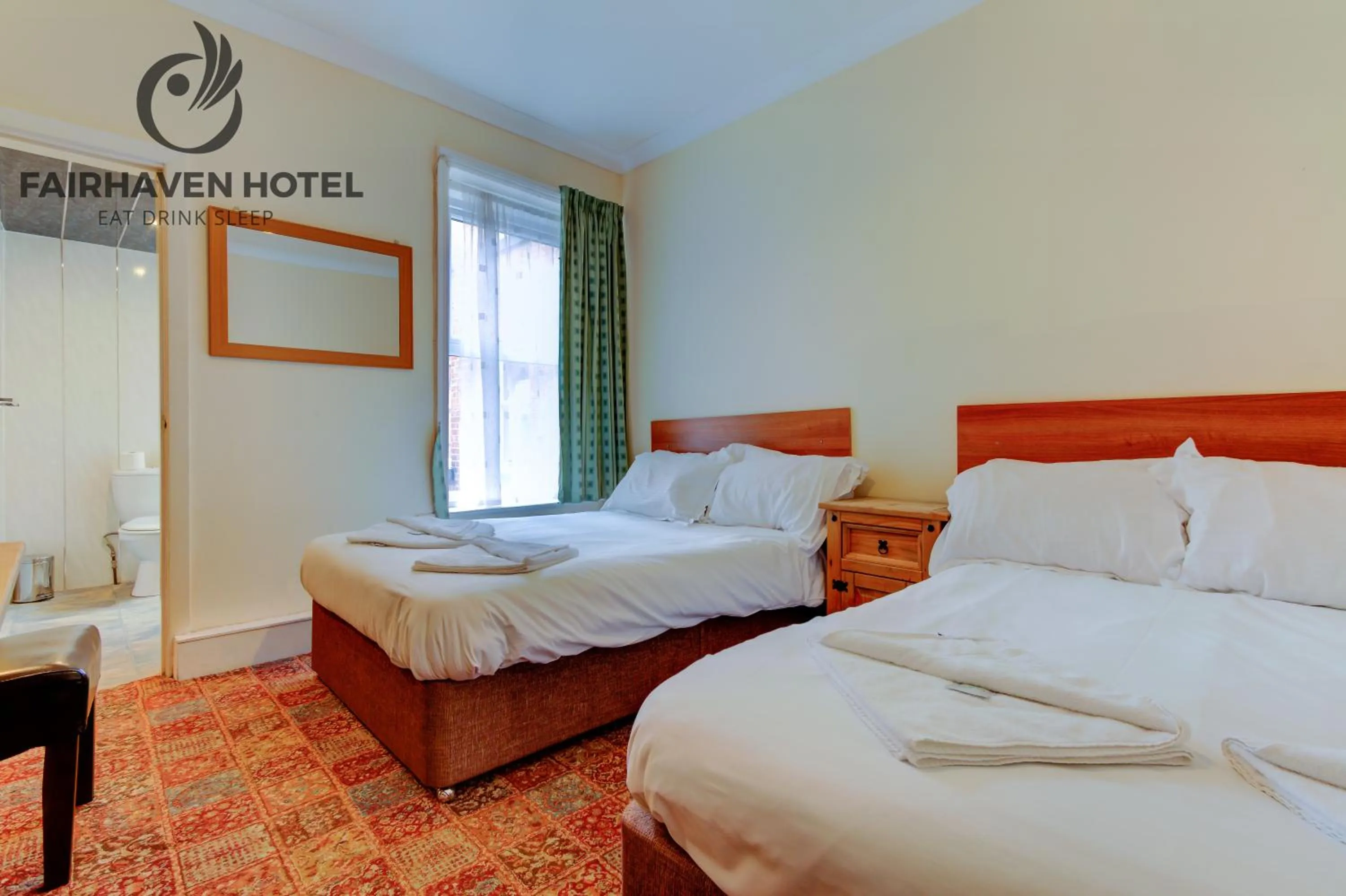 Bed in Fairhaven Hotel