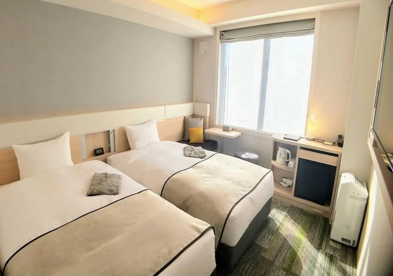 Bed in Urban Hotel Kyoto Gojo Premium