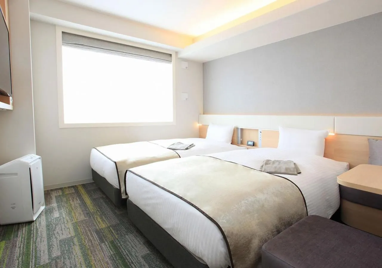 Bed in Urban Hotel Kyoto Gojo Premium