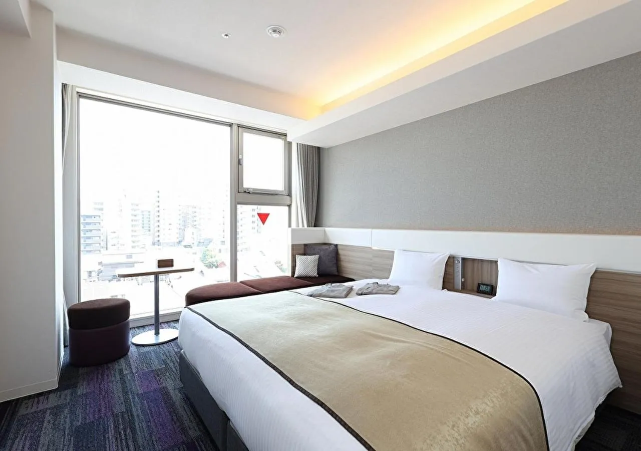 Bed in Urban Hotel Kyoto Gojo Premium