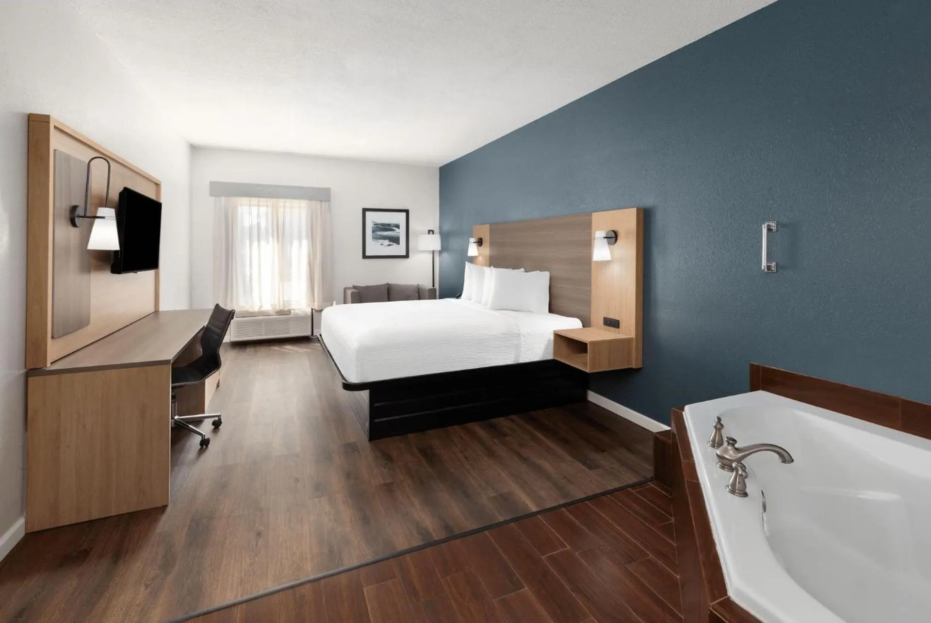 Photo of the whole room, Bed in Baymont by Wyndham Moss Point Pascagoula