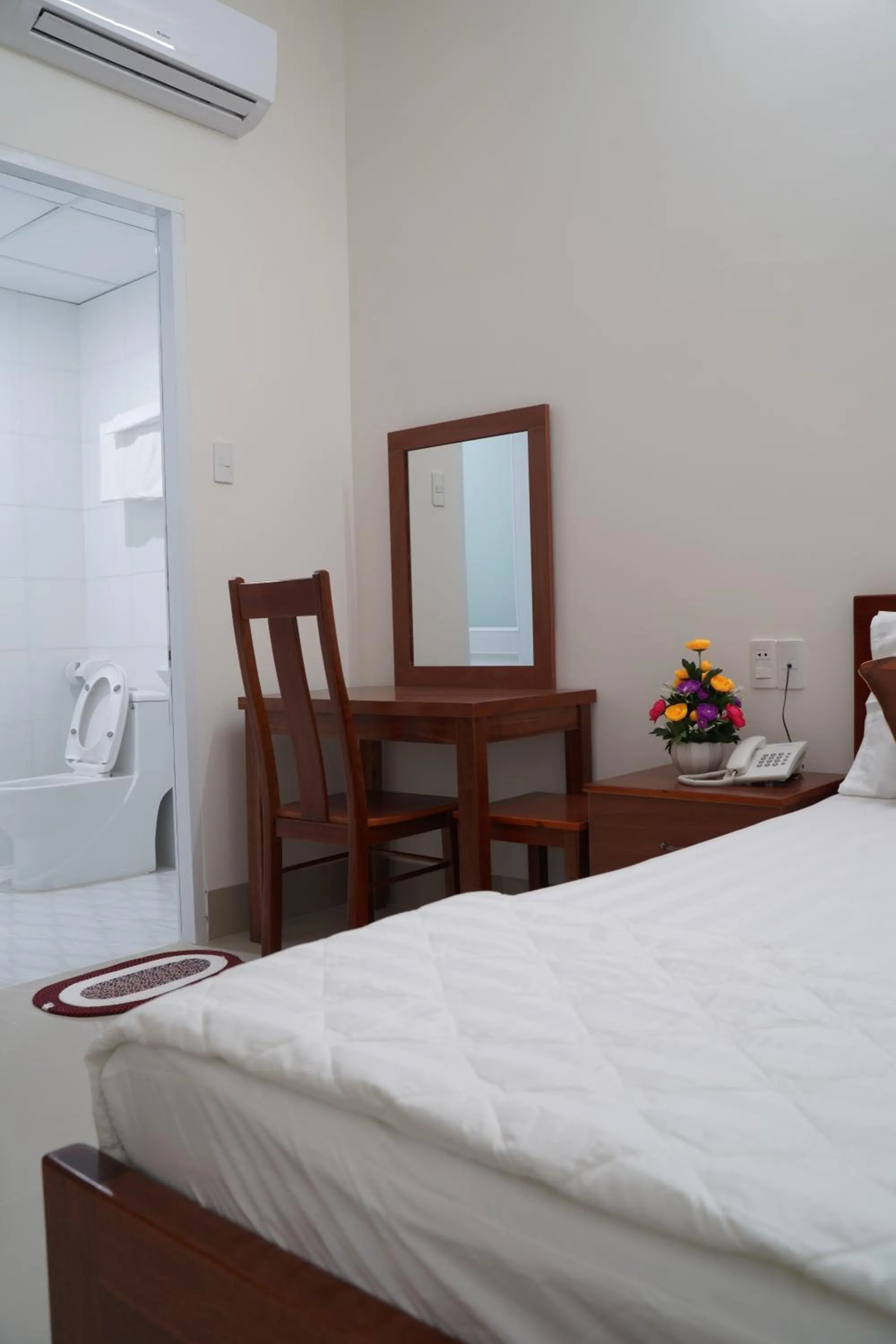 Bed in Jupiter Hotel