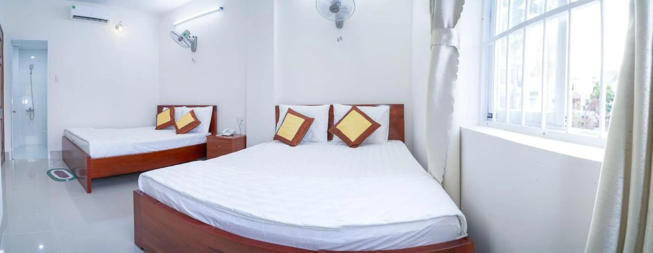 Bed in Jupiter Hotel