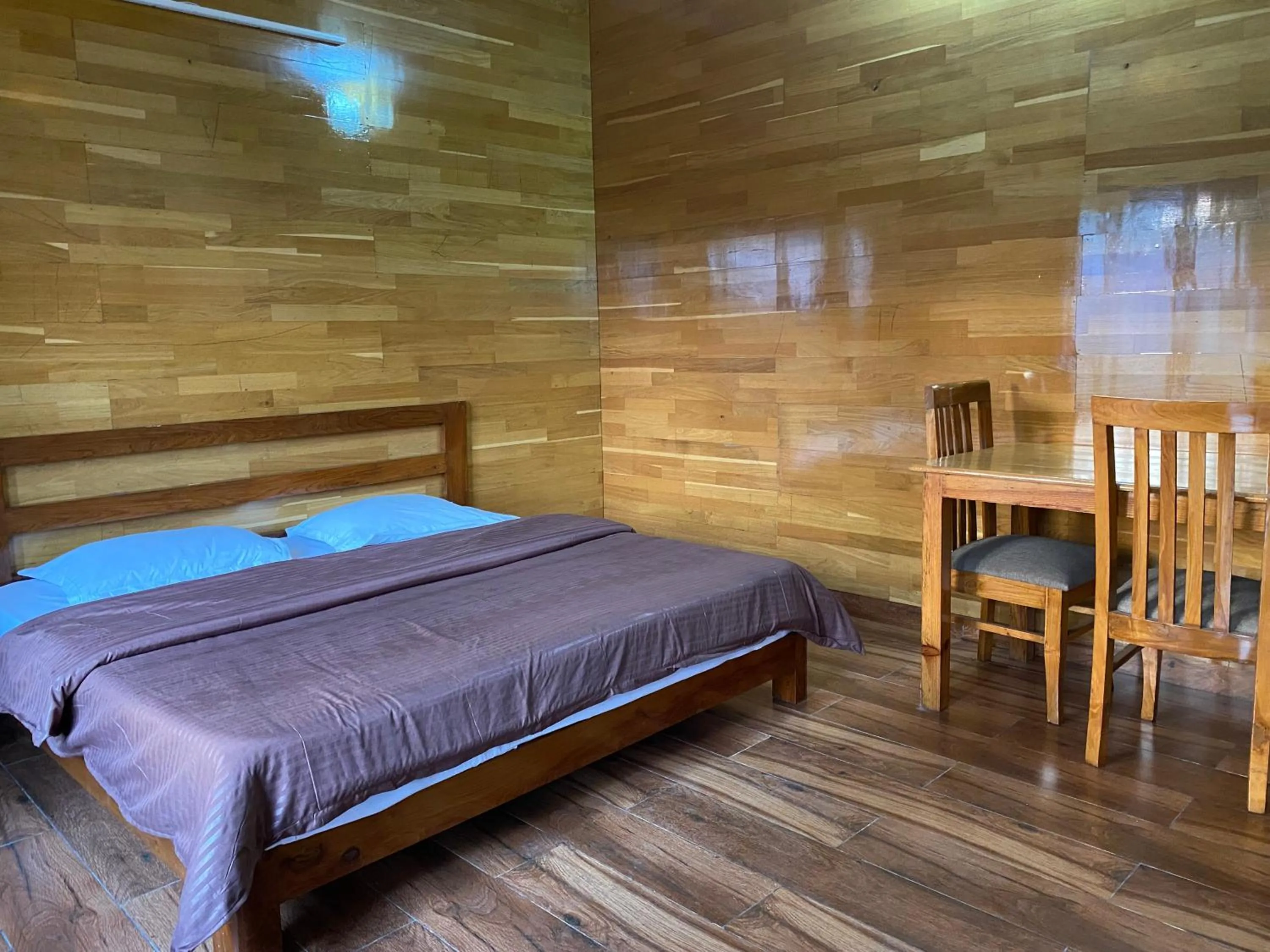 Bed in Khushi Cottage