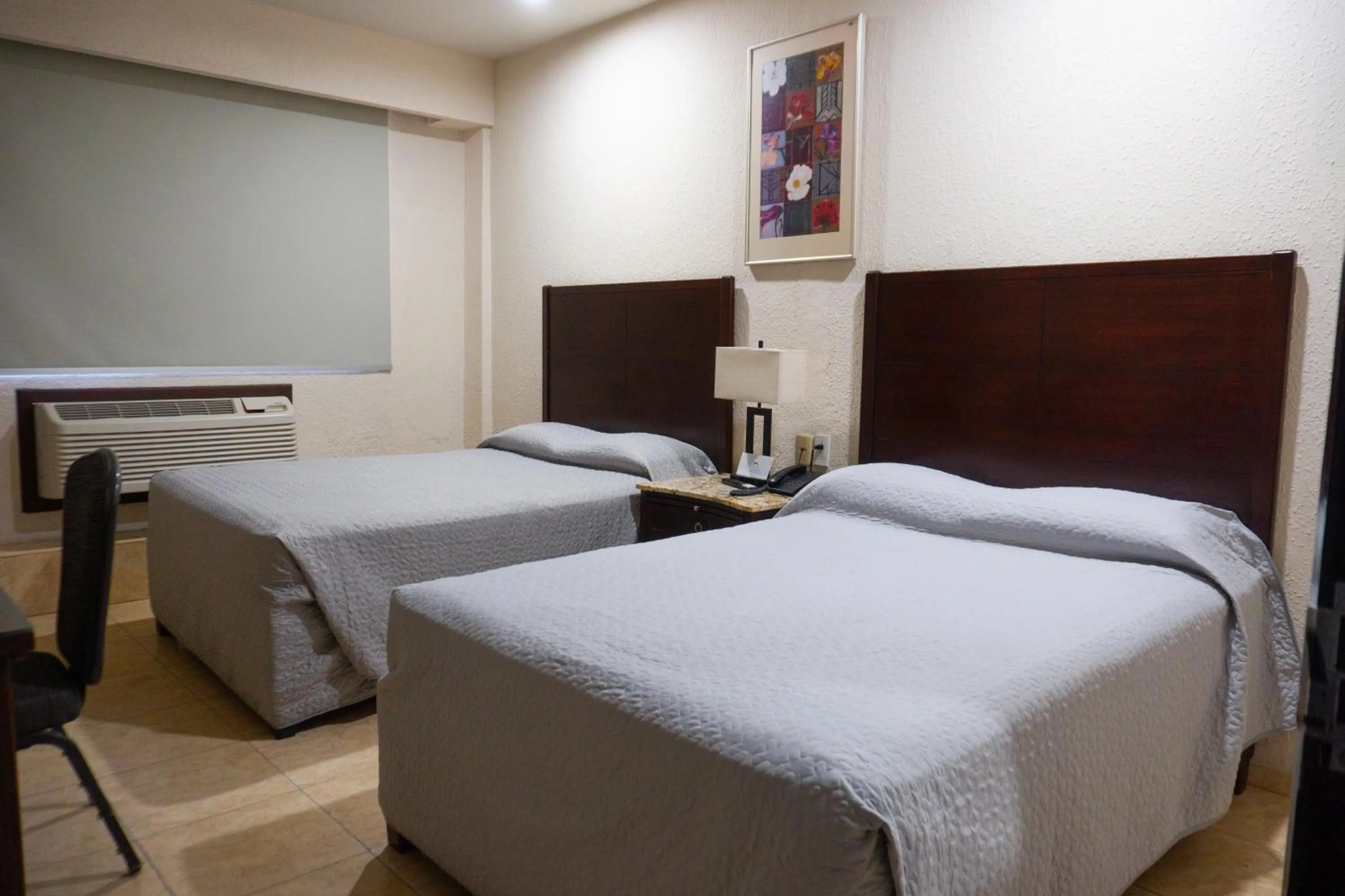 Bed in Hotel America Palacio