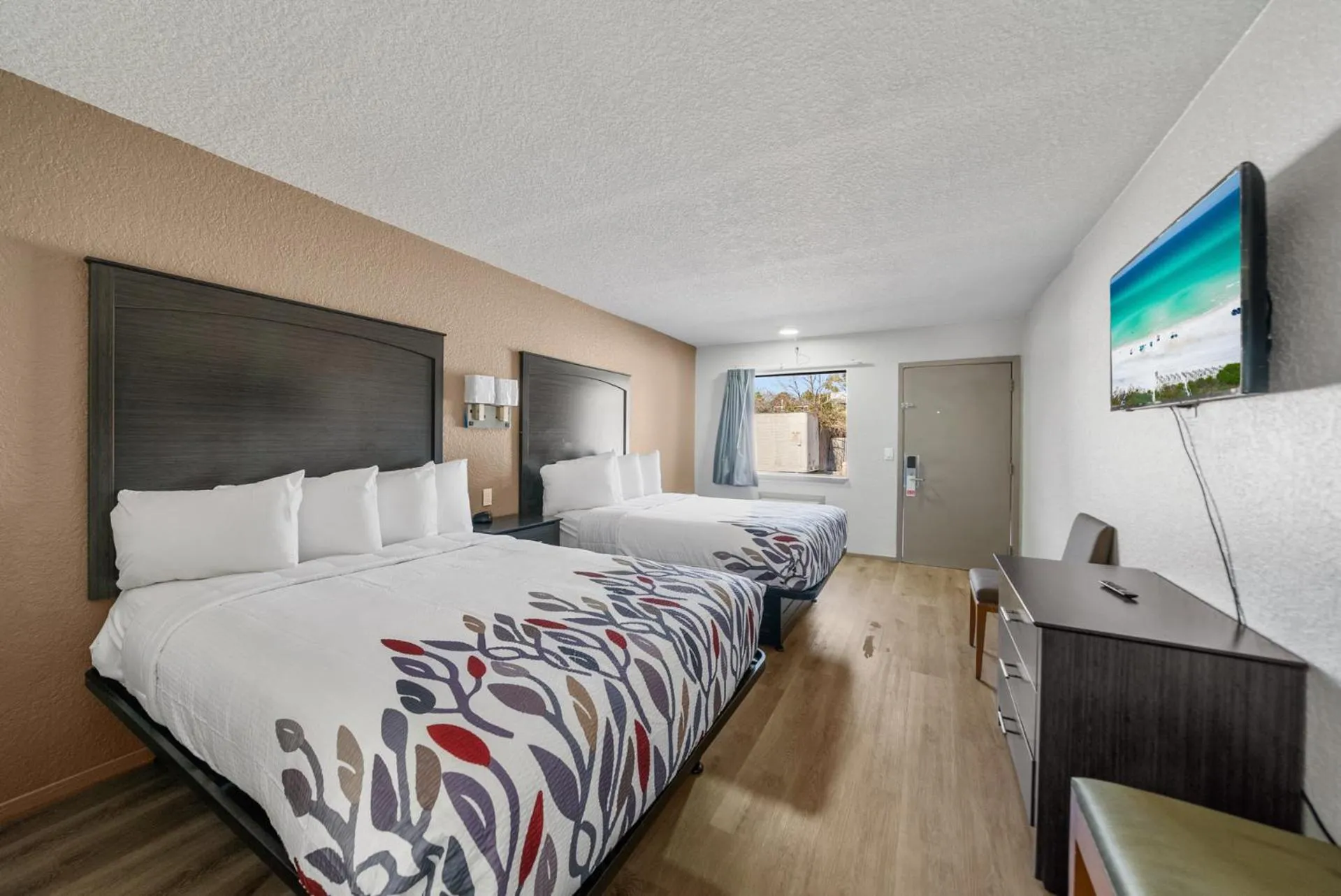 Bed in Executive Inn - Panama City Beach