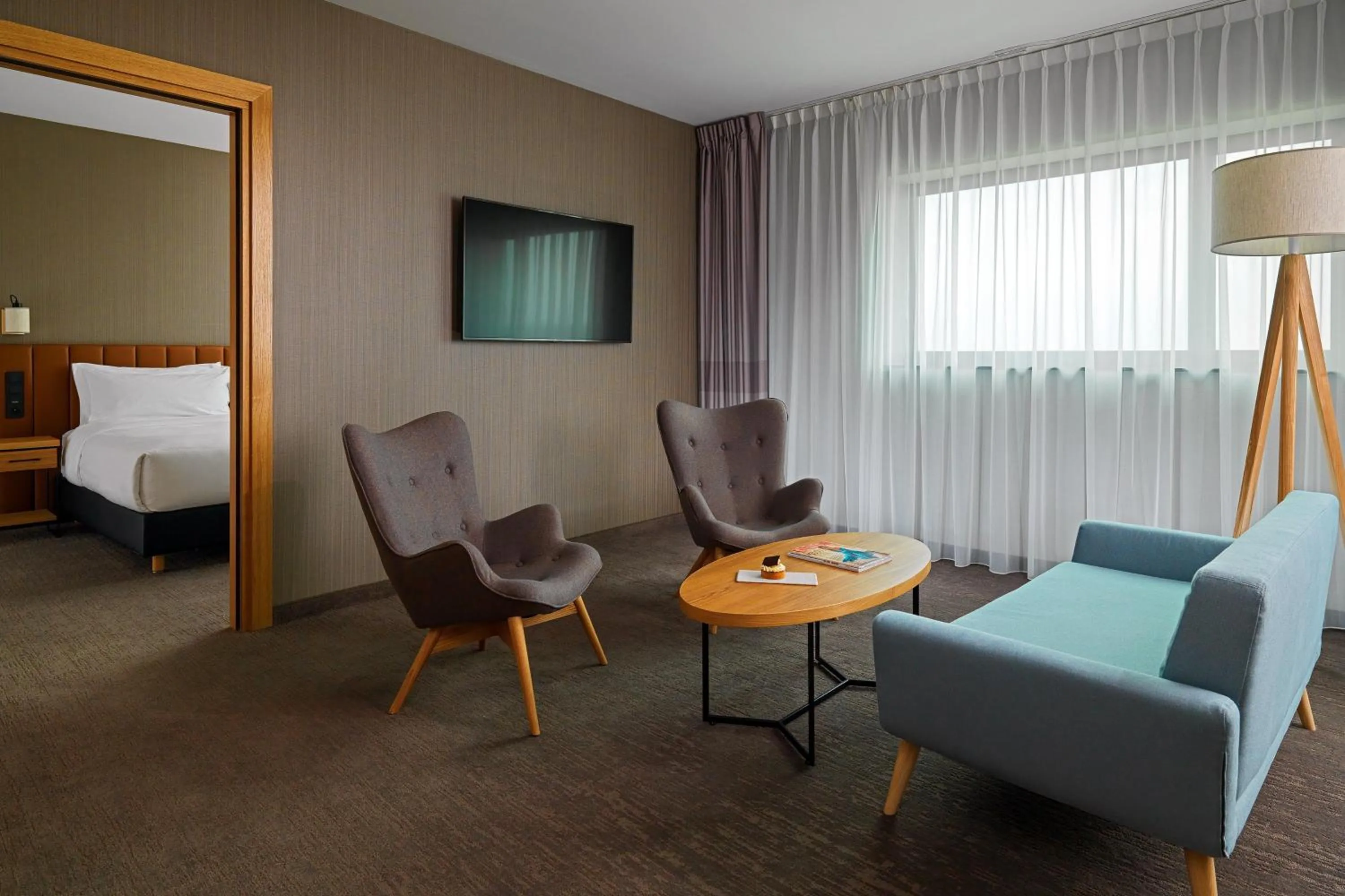 Living room, Bed in Four Points by Sheraton Warsaw Mokotow