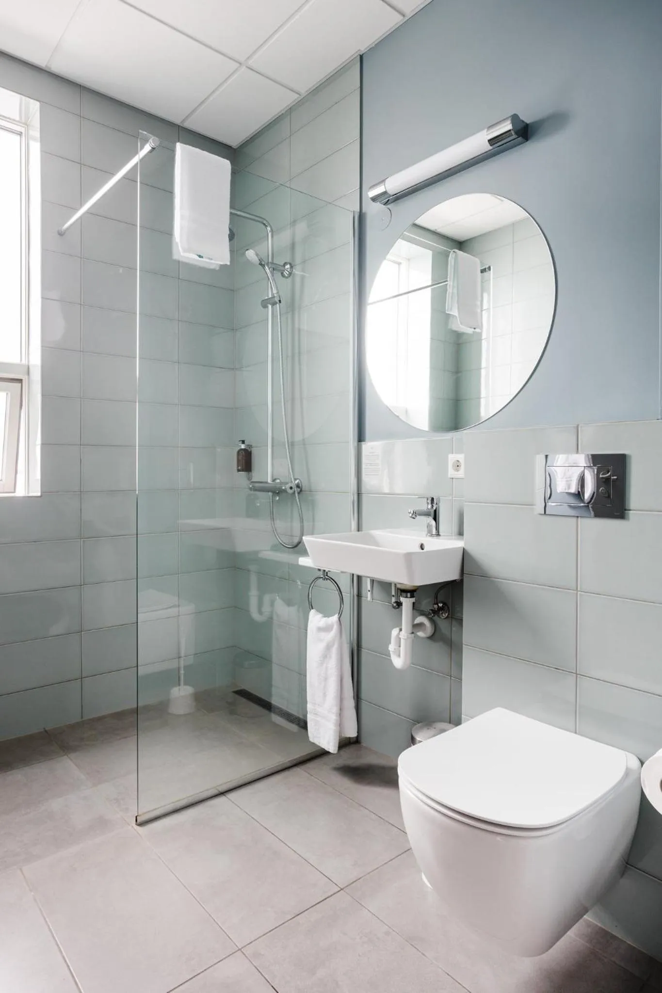 Bathroom in ODDSSON Midtown Hotel