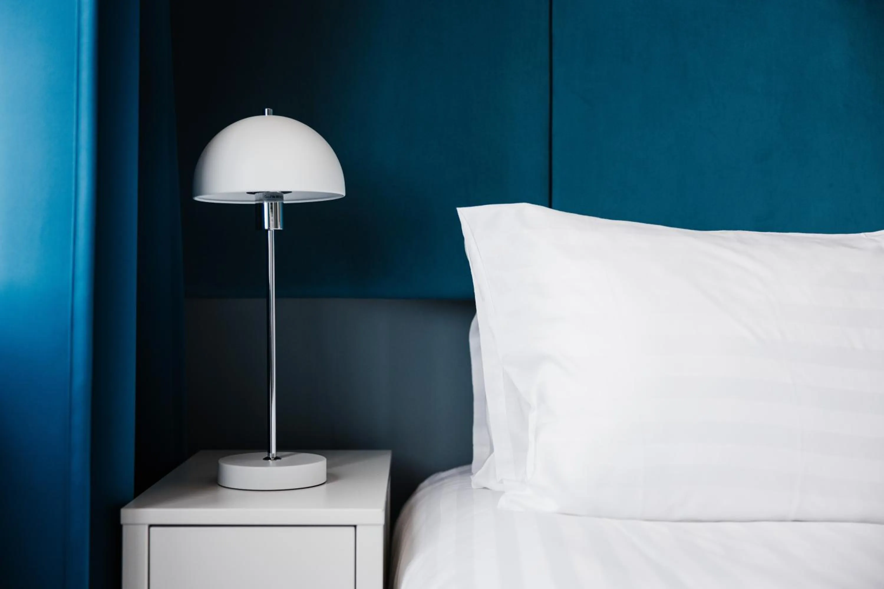 Bed in ODDSSON Midtown Hotel