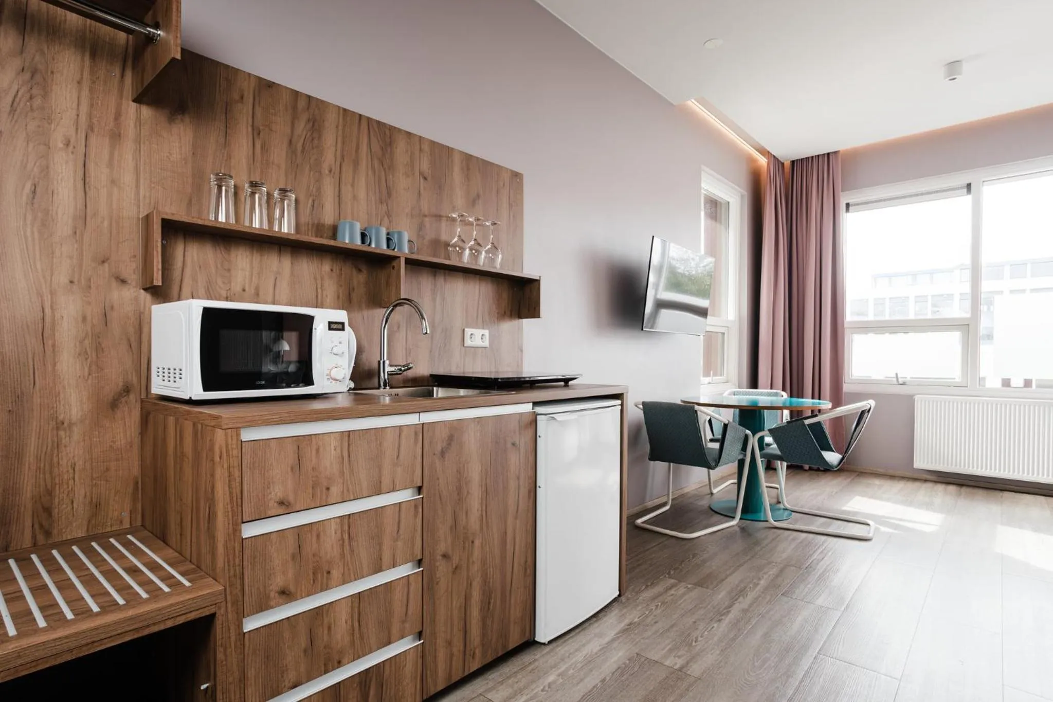 Kitchen or kitchenette in ODDSSON Midtown Hotel