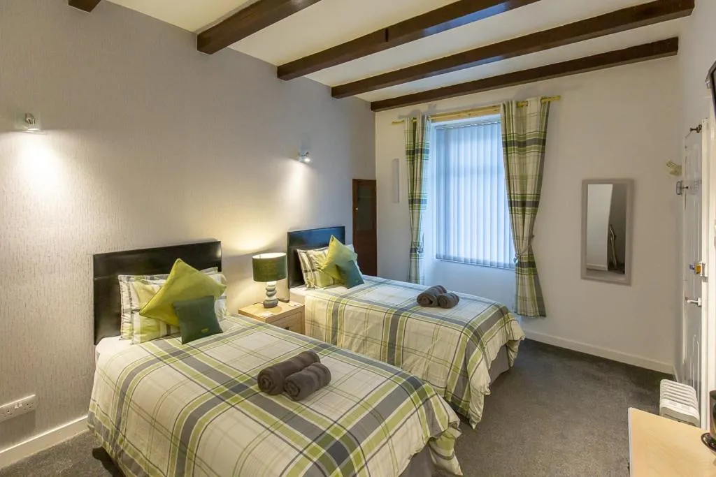 Bed in The Trout Fly Guest House