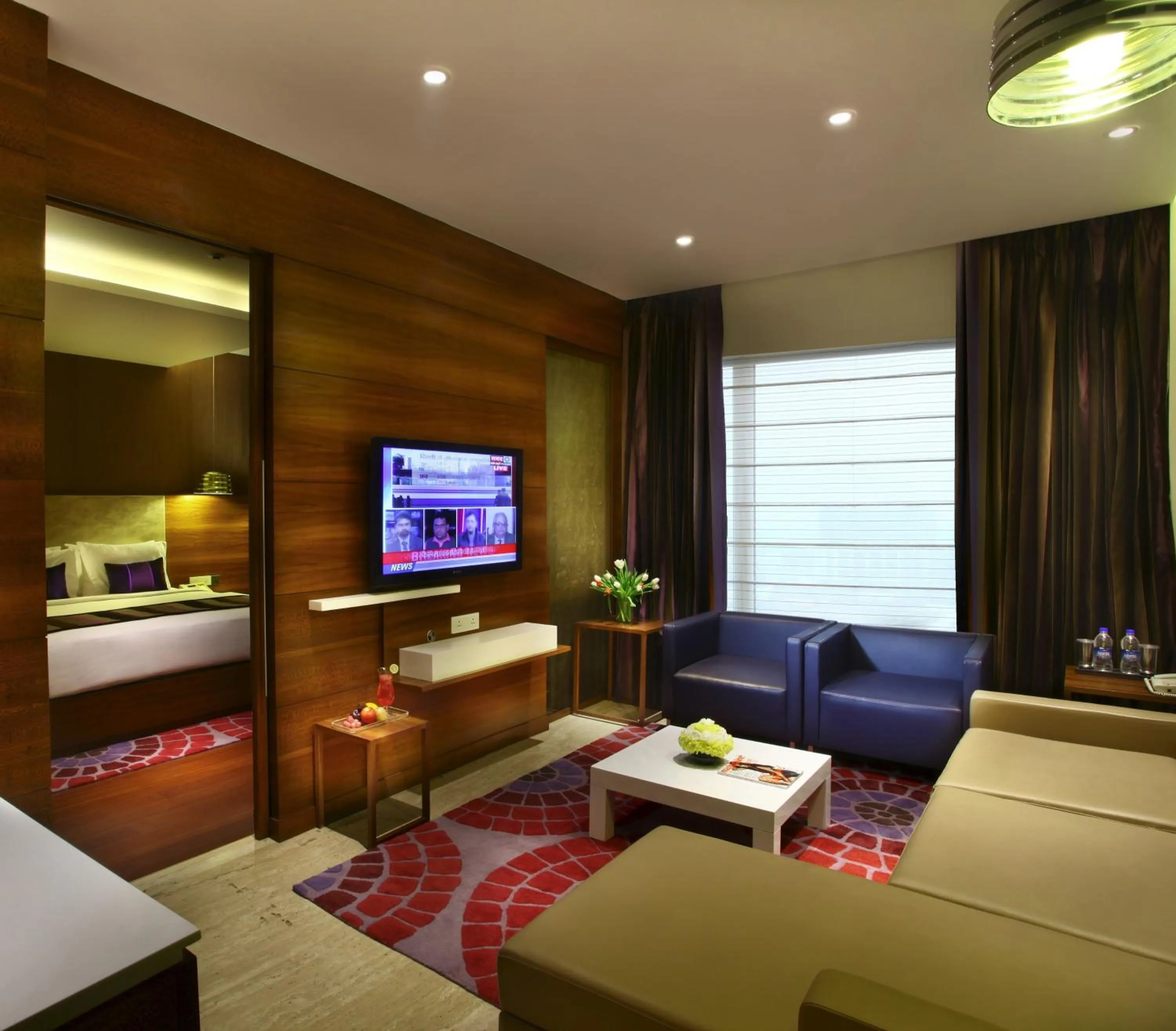 Living room, Bed in Park Plaza Shahdara