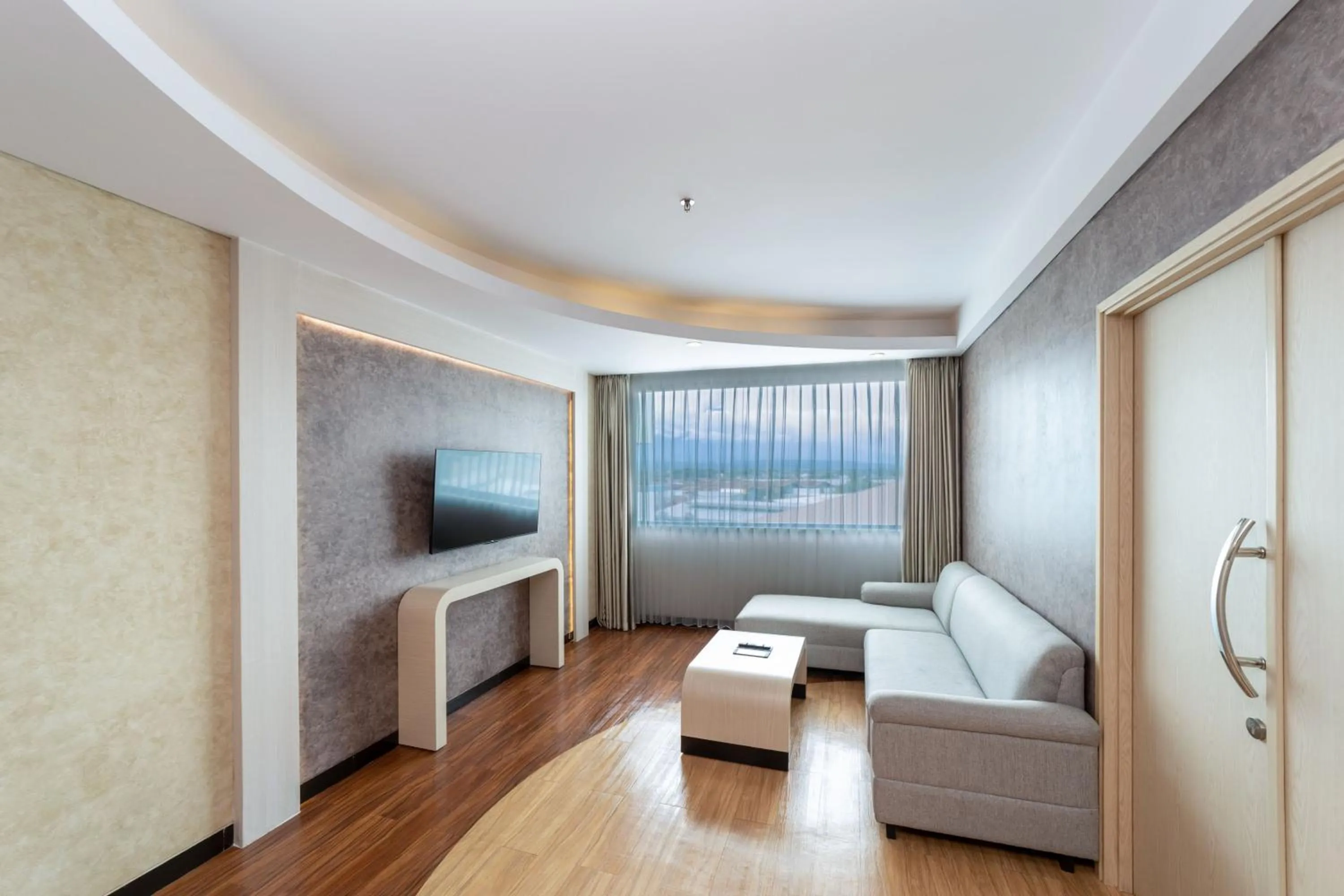 Seating area, Bed in Aston Cirebon Hotel and Convention Center