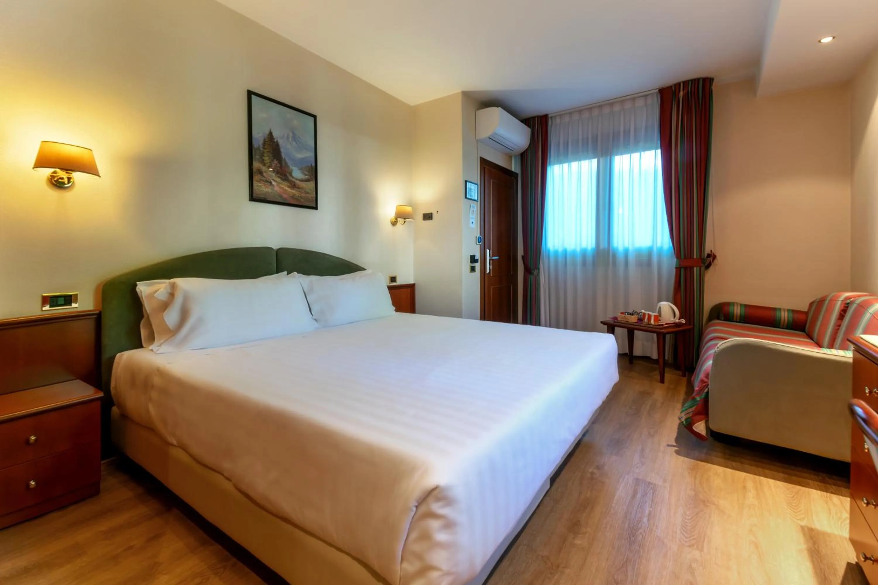 Coffee/tea facilities, Bed in Hotel Falco D'Oro by Falco D'Oro Hotels