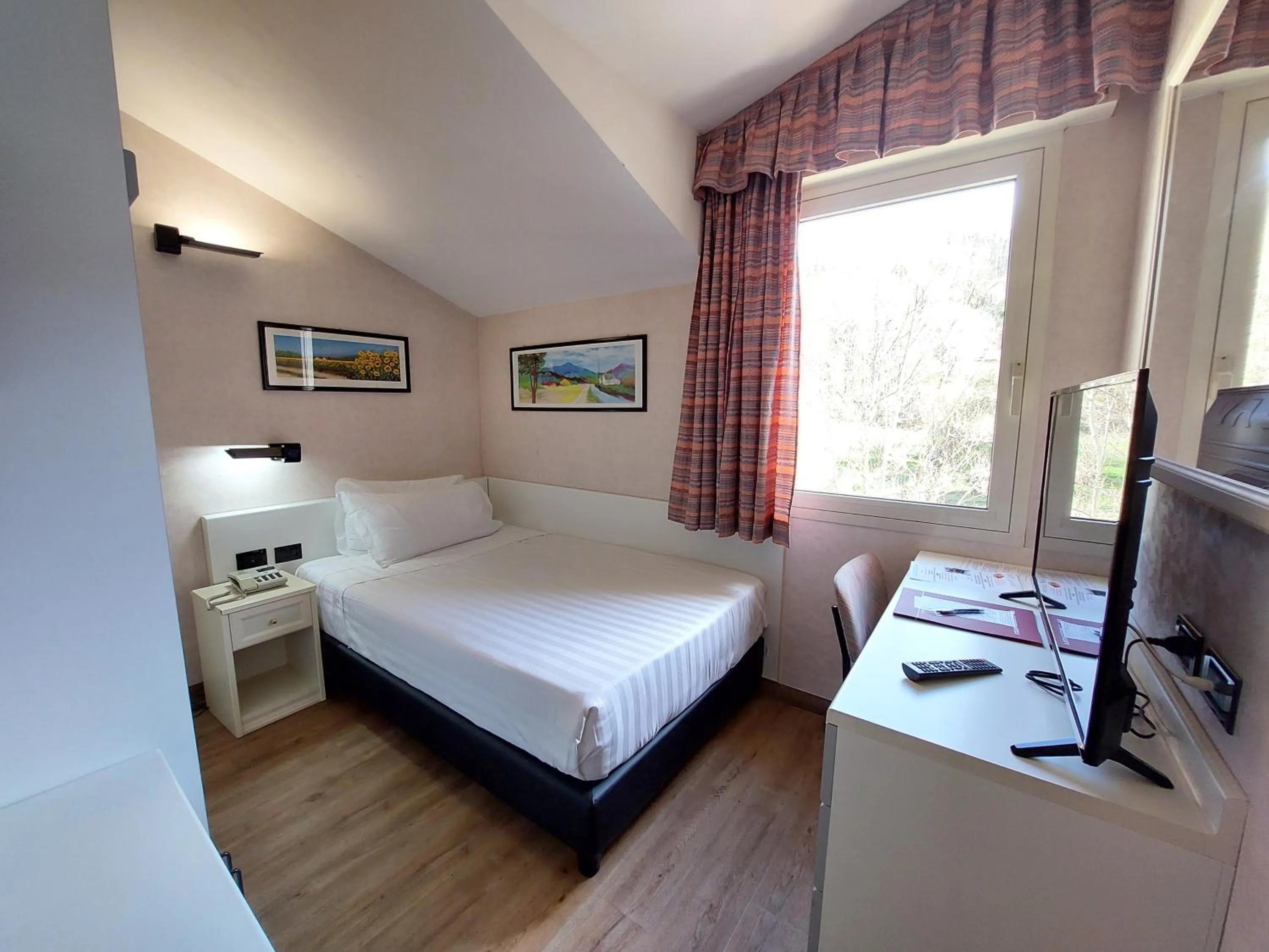 Photo of the whole room, Bed in Hotel Falco D'Oro by Falco D'Oro Hotels