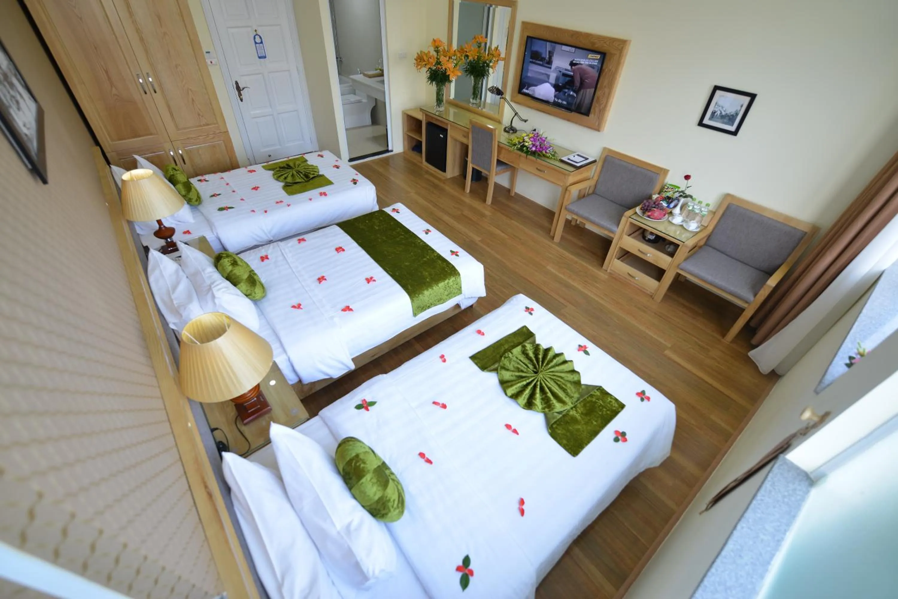 Photo of the whole room, Bed in Blue Hanoi Inn Hotel