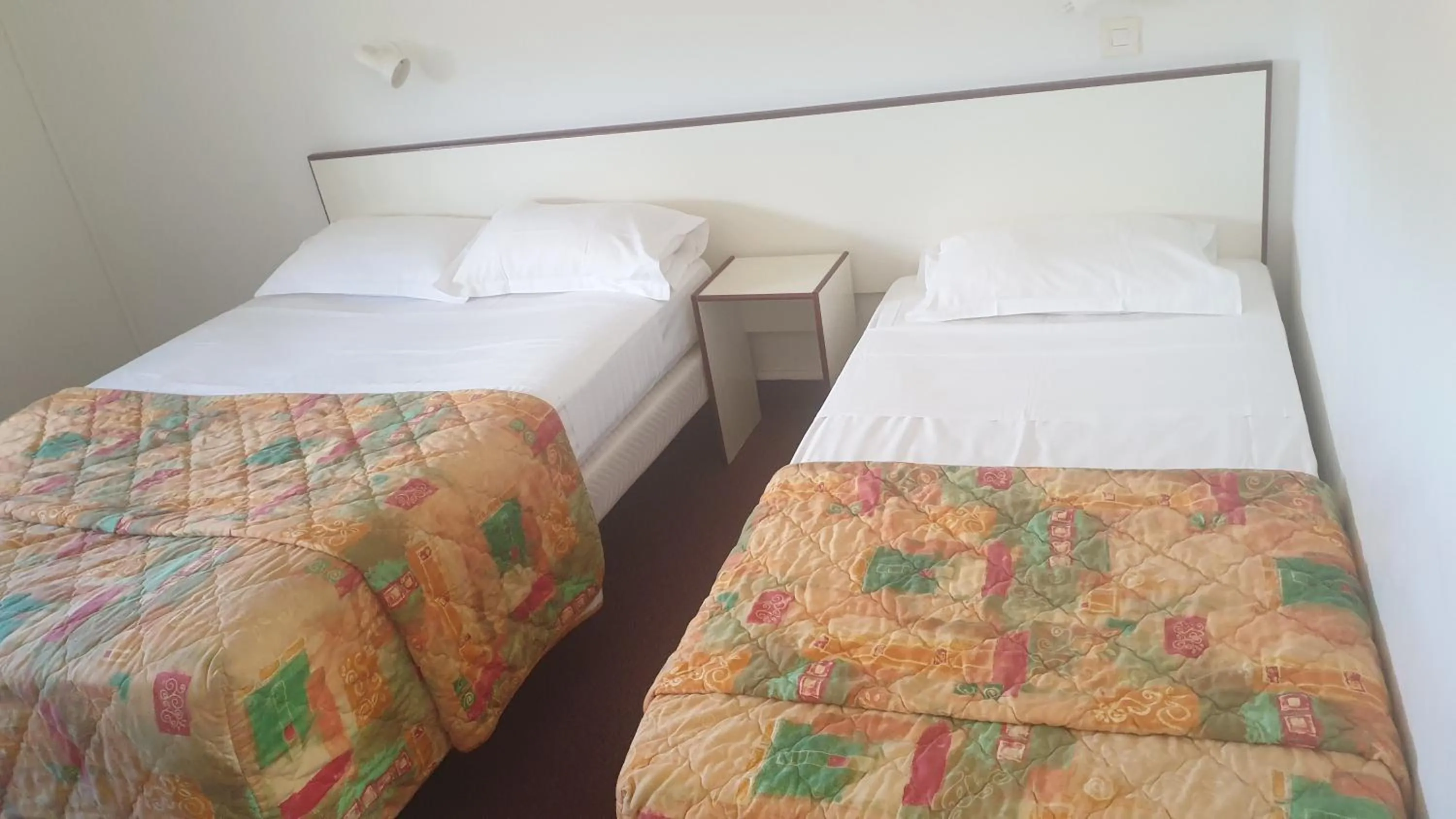 Bed in Hotel Madame Mere