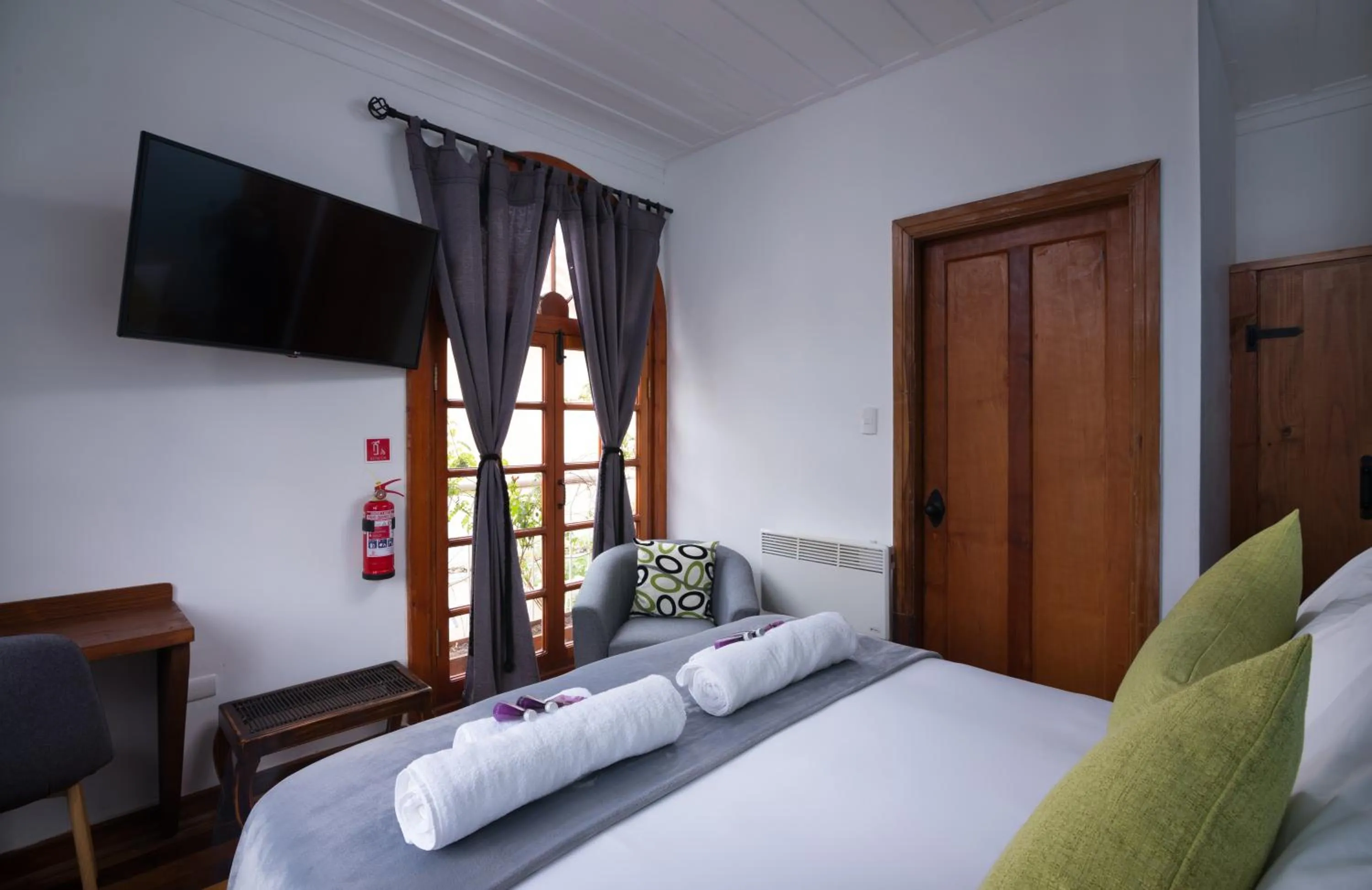 Bed in Esencia Hotel Boutique