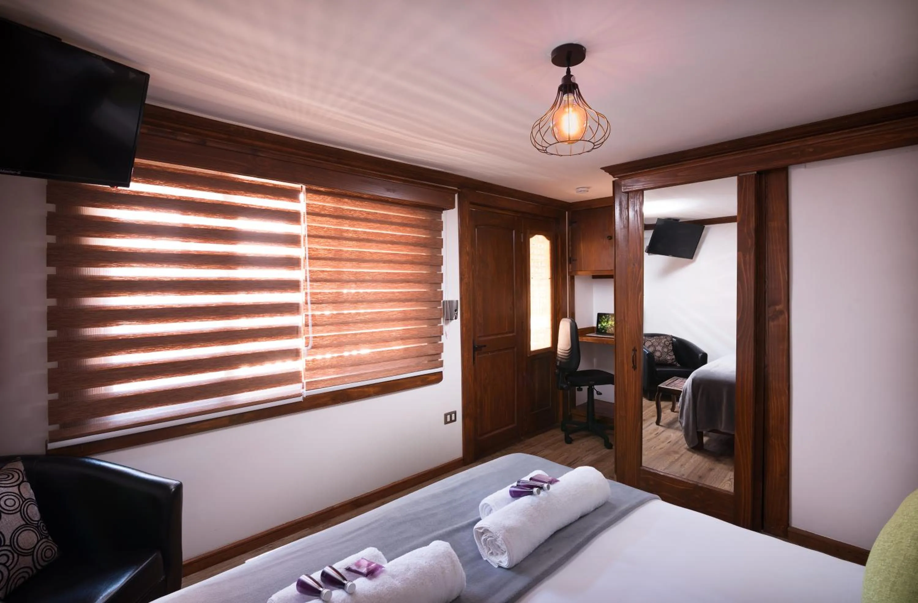 Bed in Esencia Hotel Boutique