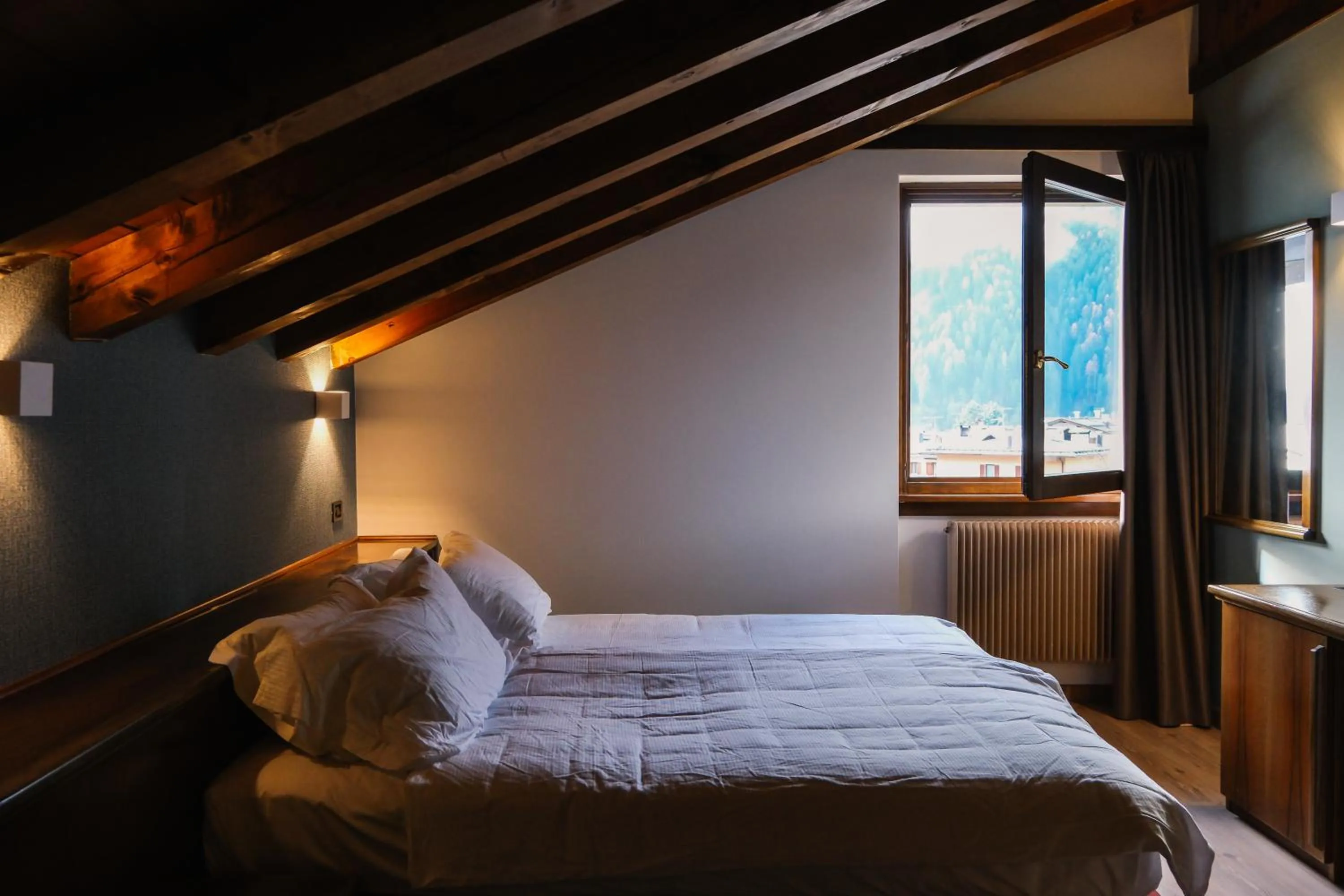 Bed in Aria Life Hotel Pinzolo